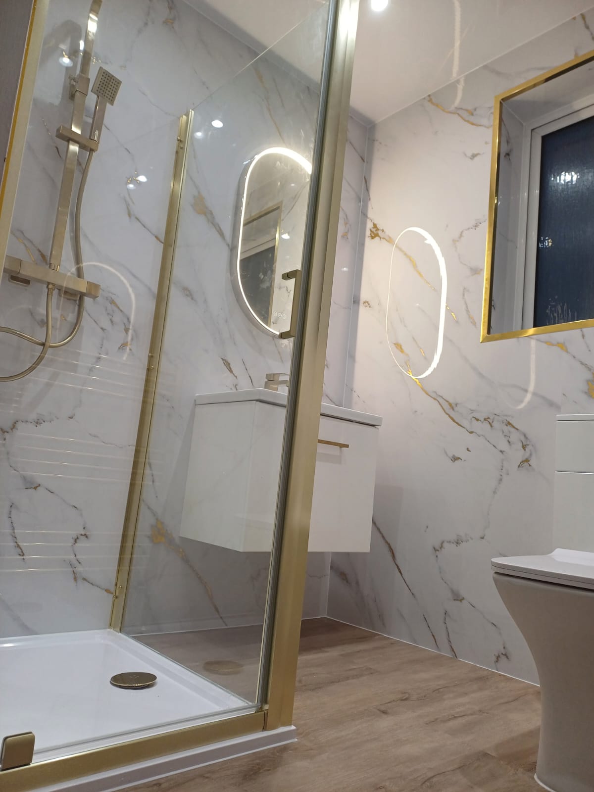 Finished bathroom using Gold Marble panels