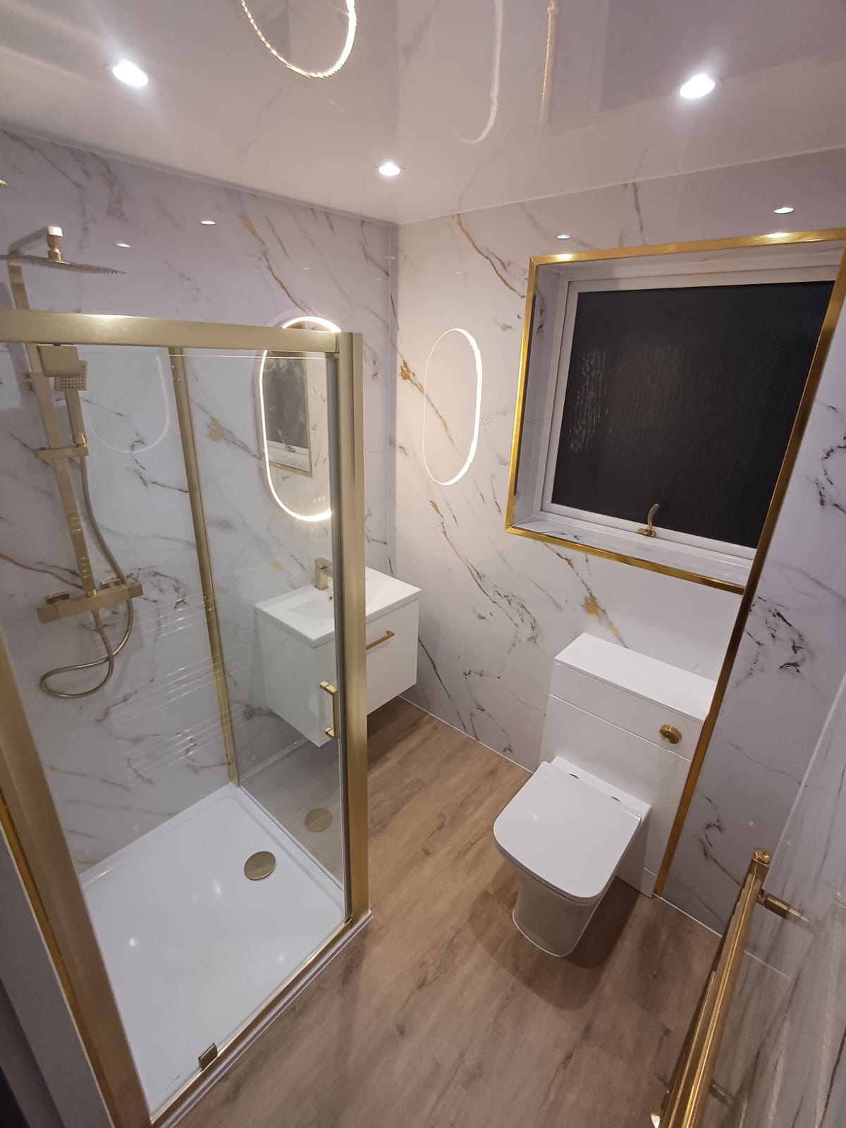 Finished bathroom using Gold Marble panels