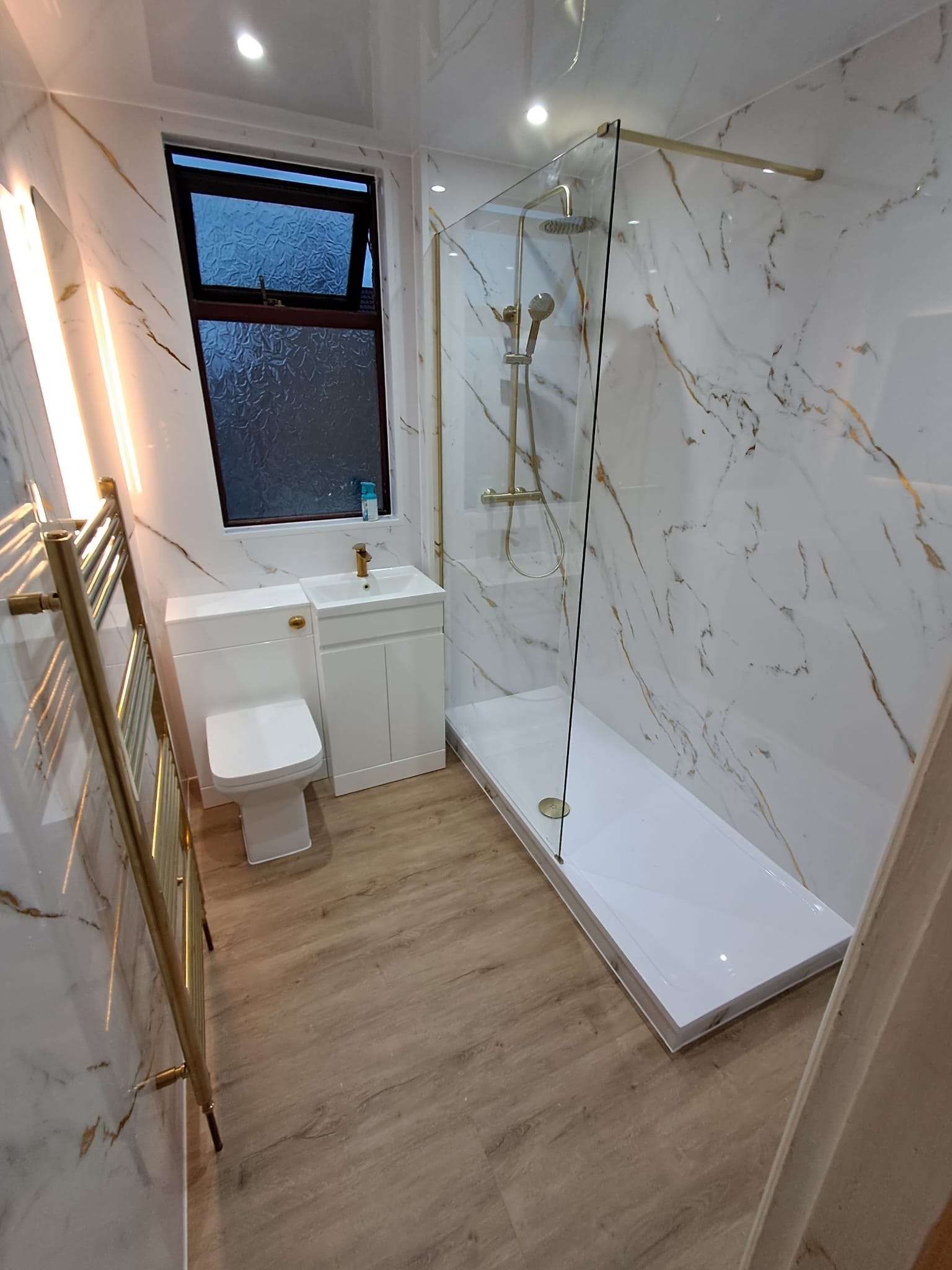 Finished bathroom using Gold Marble panels