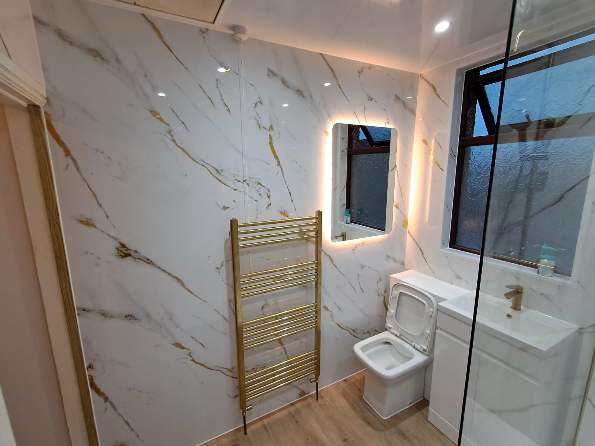 Finished bathroom using Gold Marble panels