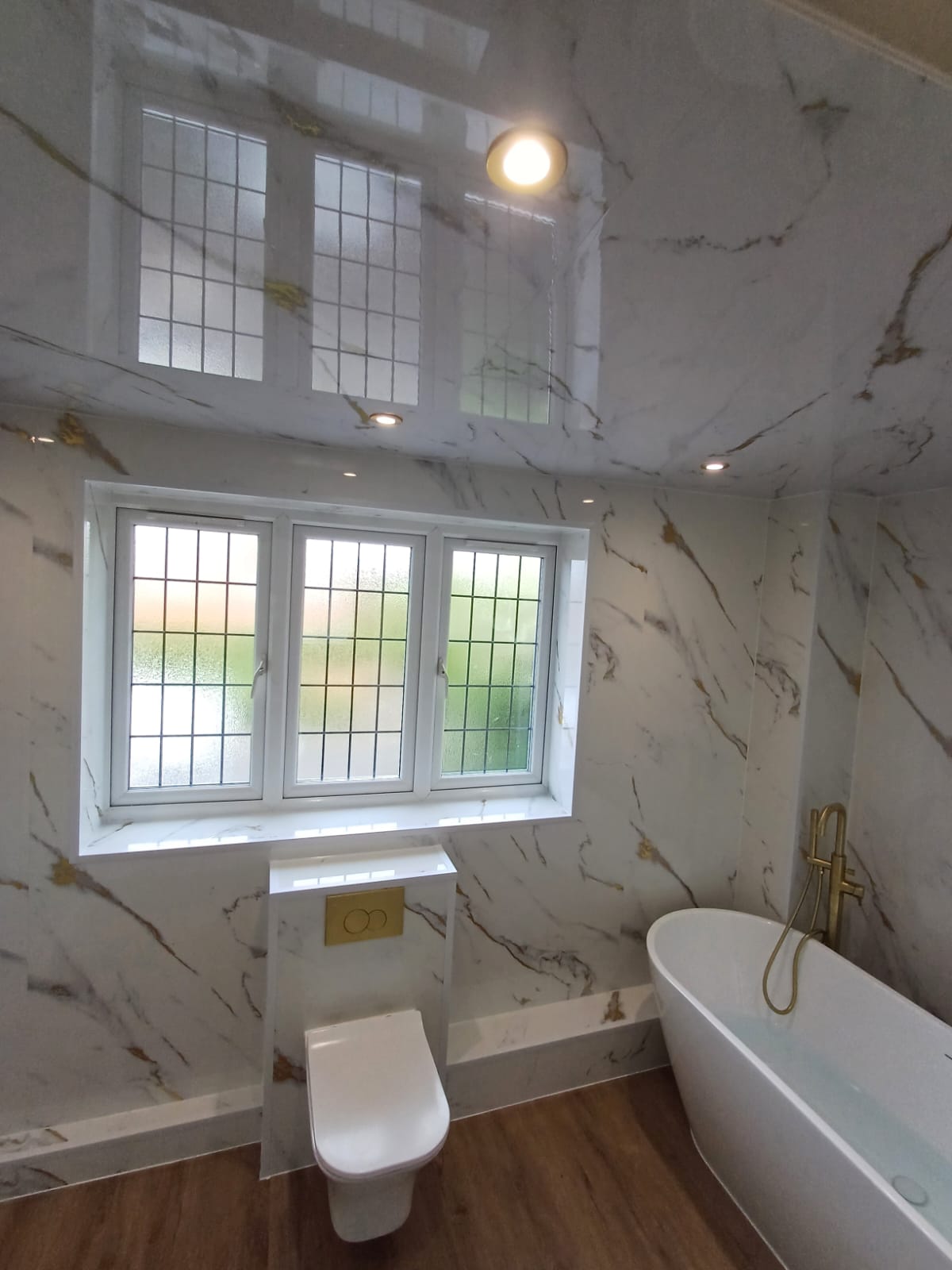 Finished bathroom using Gold Marble panels