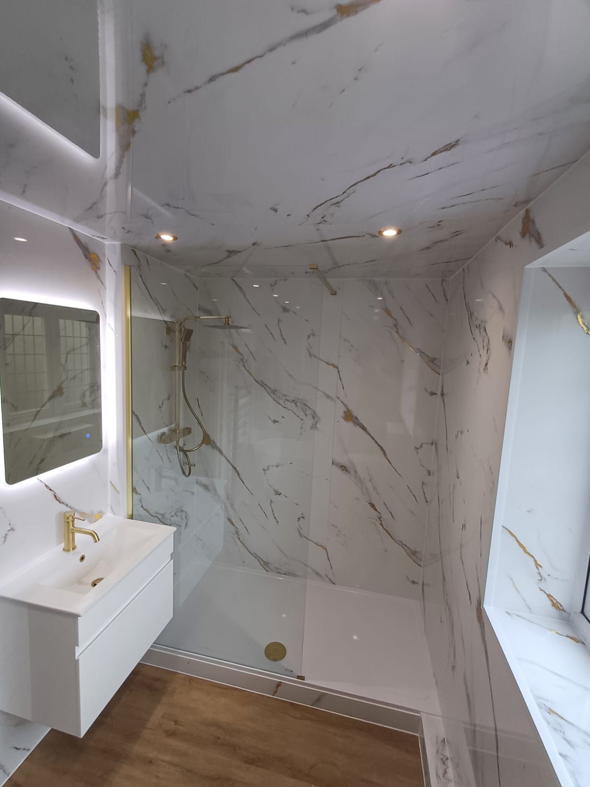 Finished bathroom using Gold Marble panels