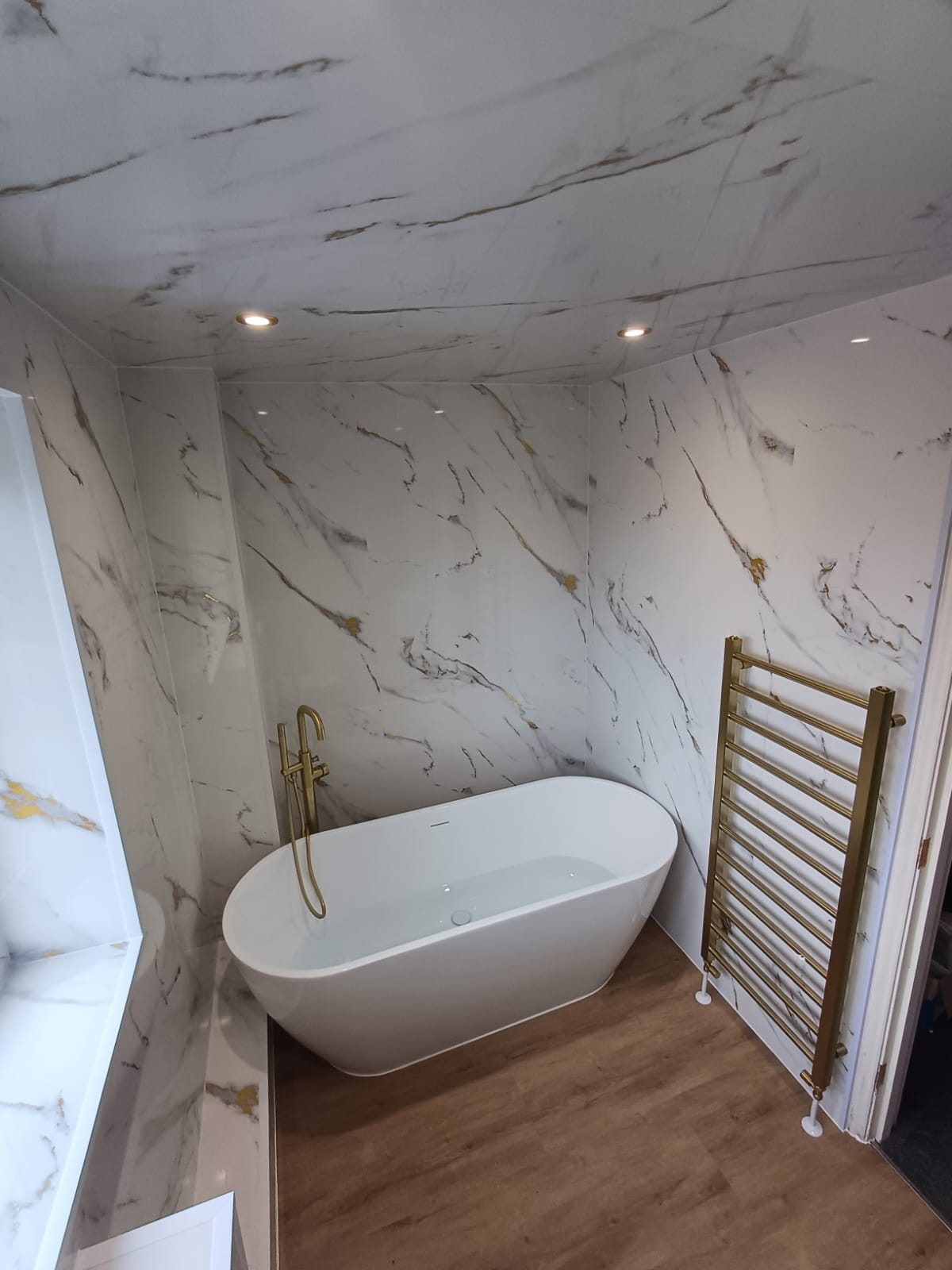 Finished bathroom using Gold Marble panels