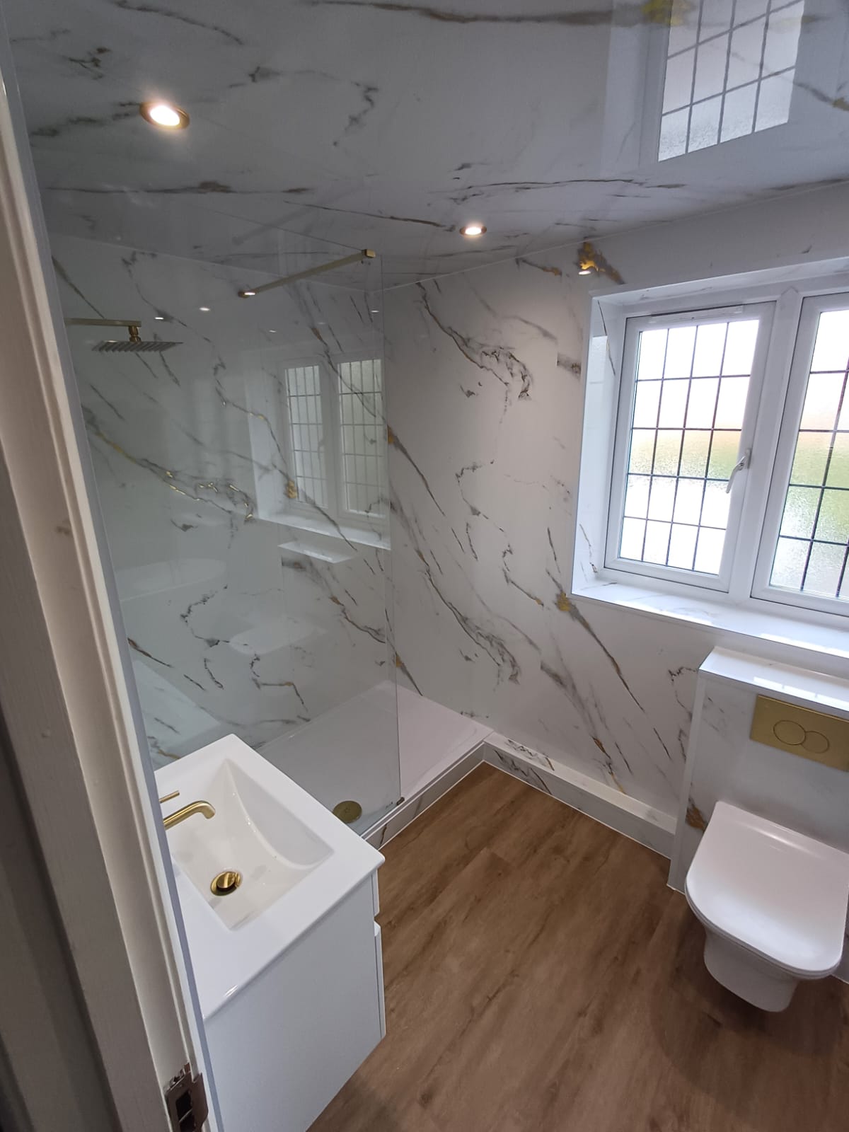 Finished bathroom using Gold Marble panels