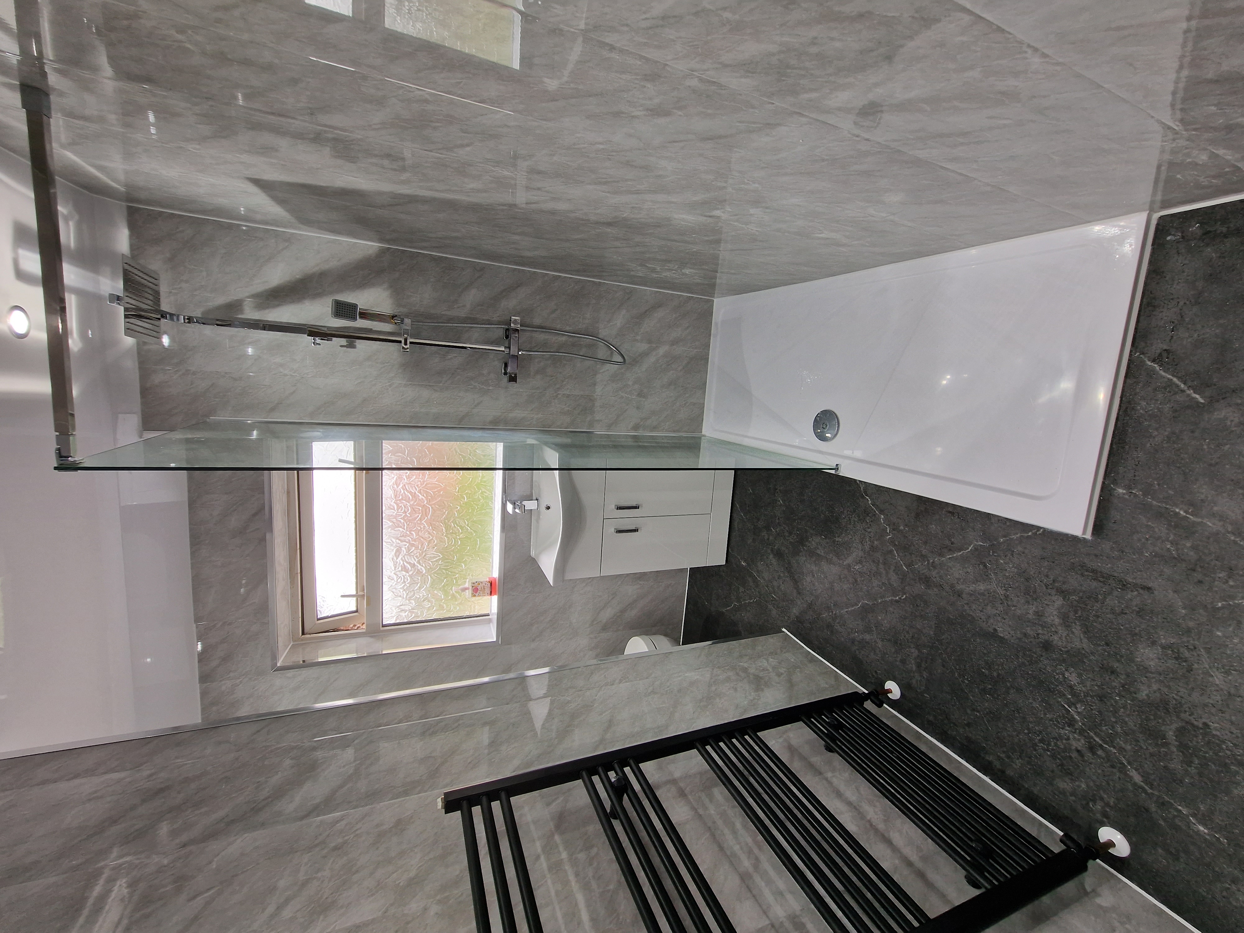 Finished bathroom using Grey Marble panels