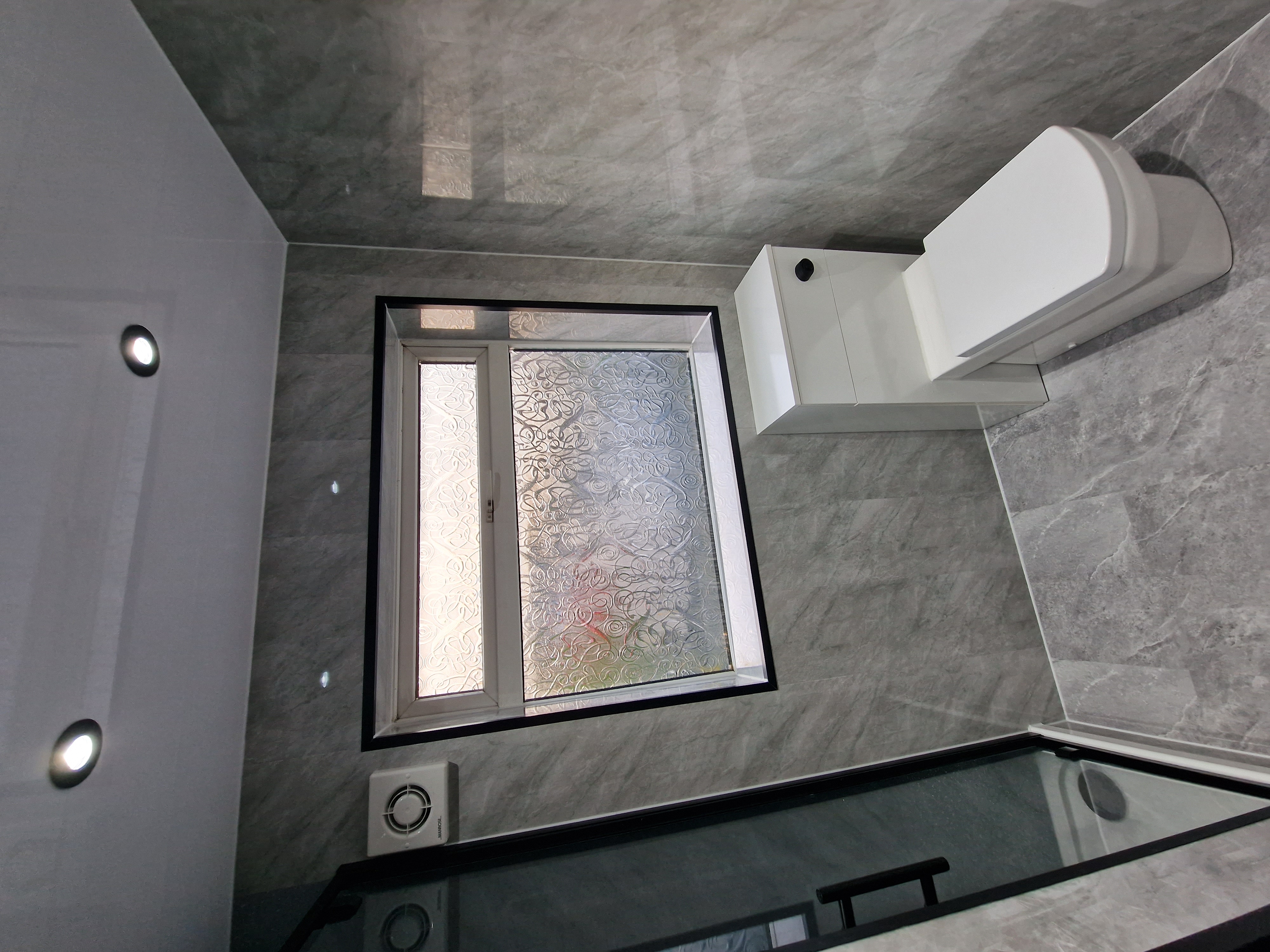 Finished bathroom using Grey Marble panels