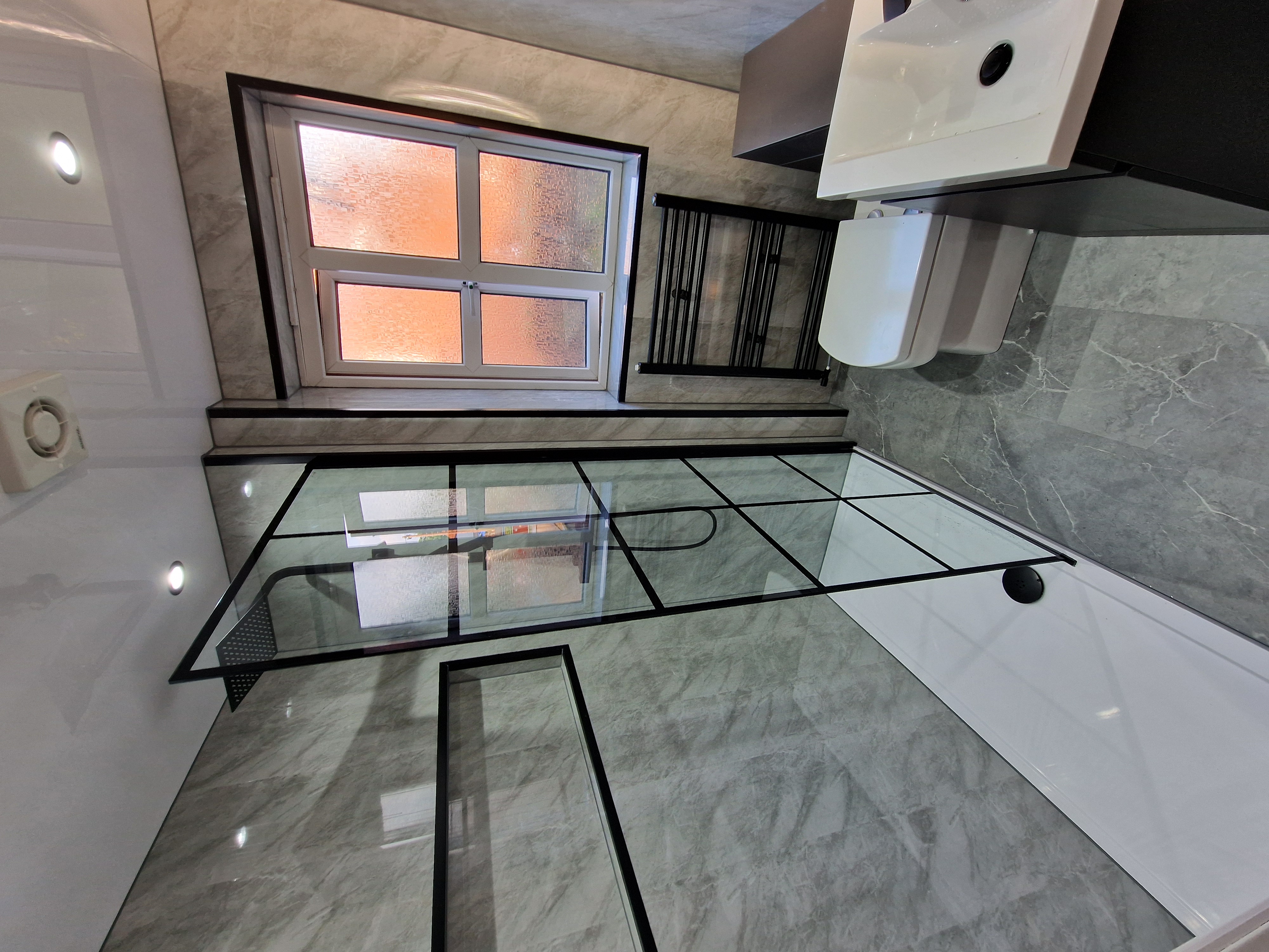 Finished bathroom using Grey Marble panels