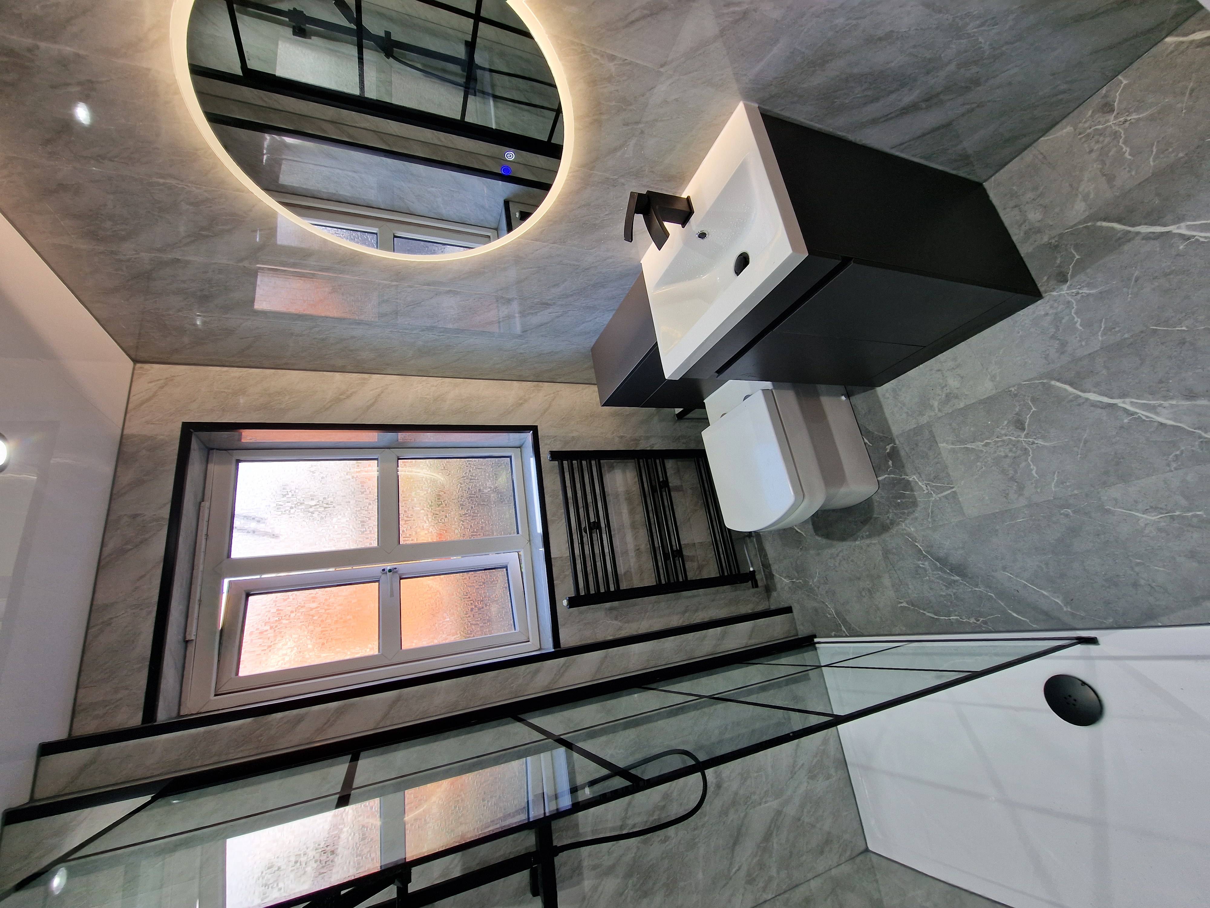 Finished bathroom using Grey Marble panels