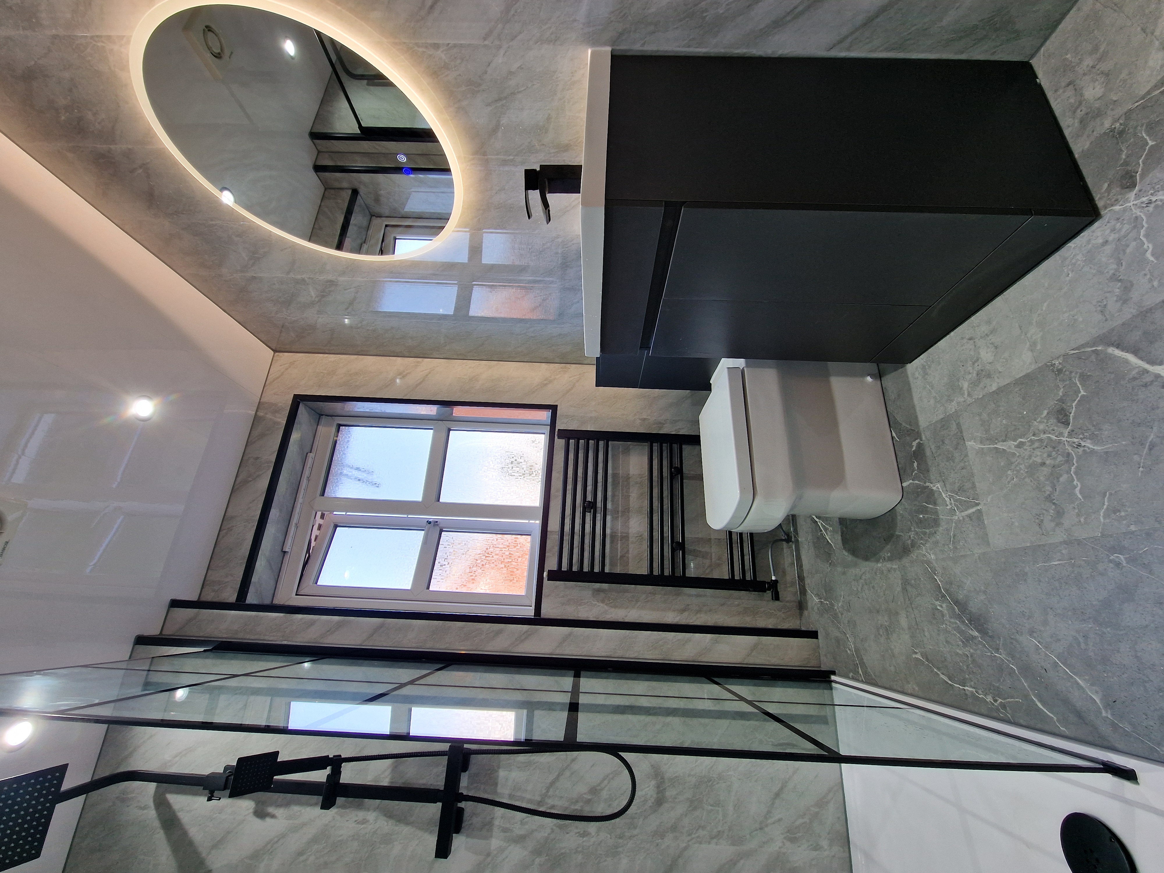 Finished bathroom using Grey Marble panels