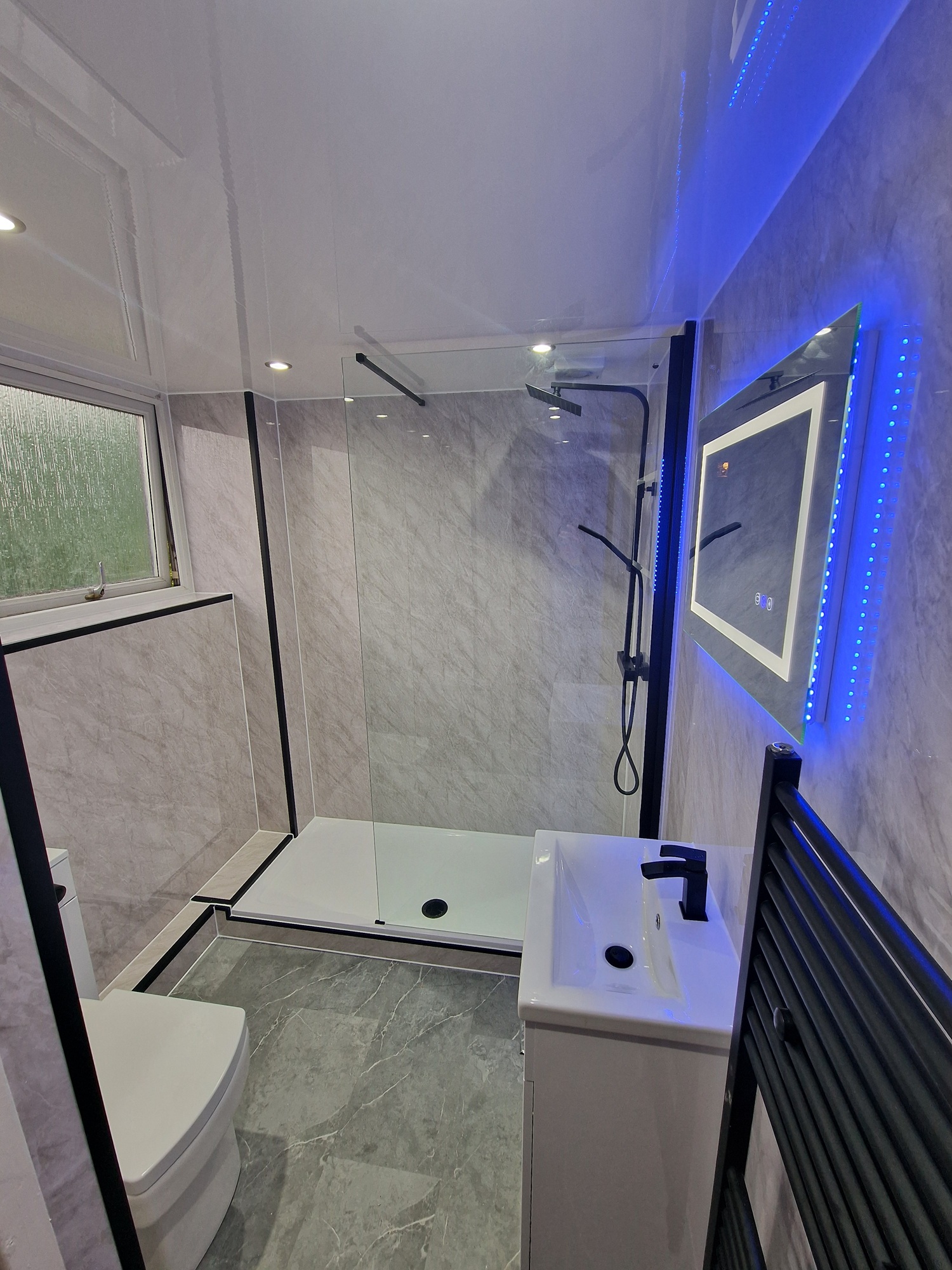 Finished bathroom using Grey Marble panels