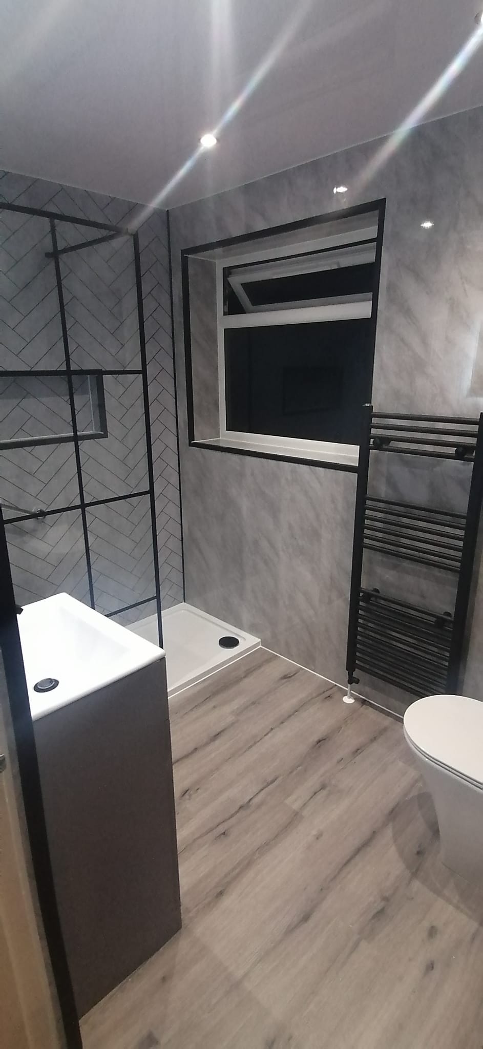 Finished bathroom using Grey Marble panels
