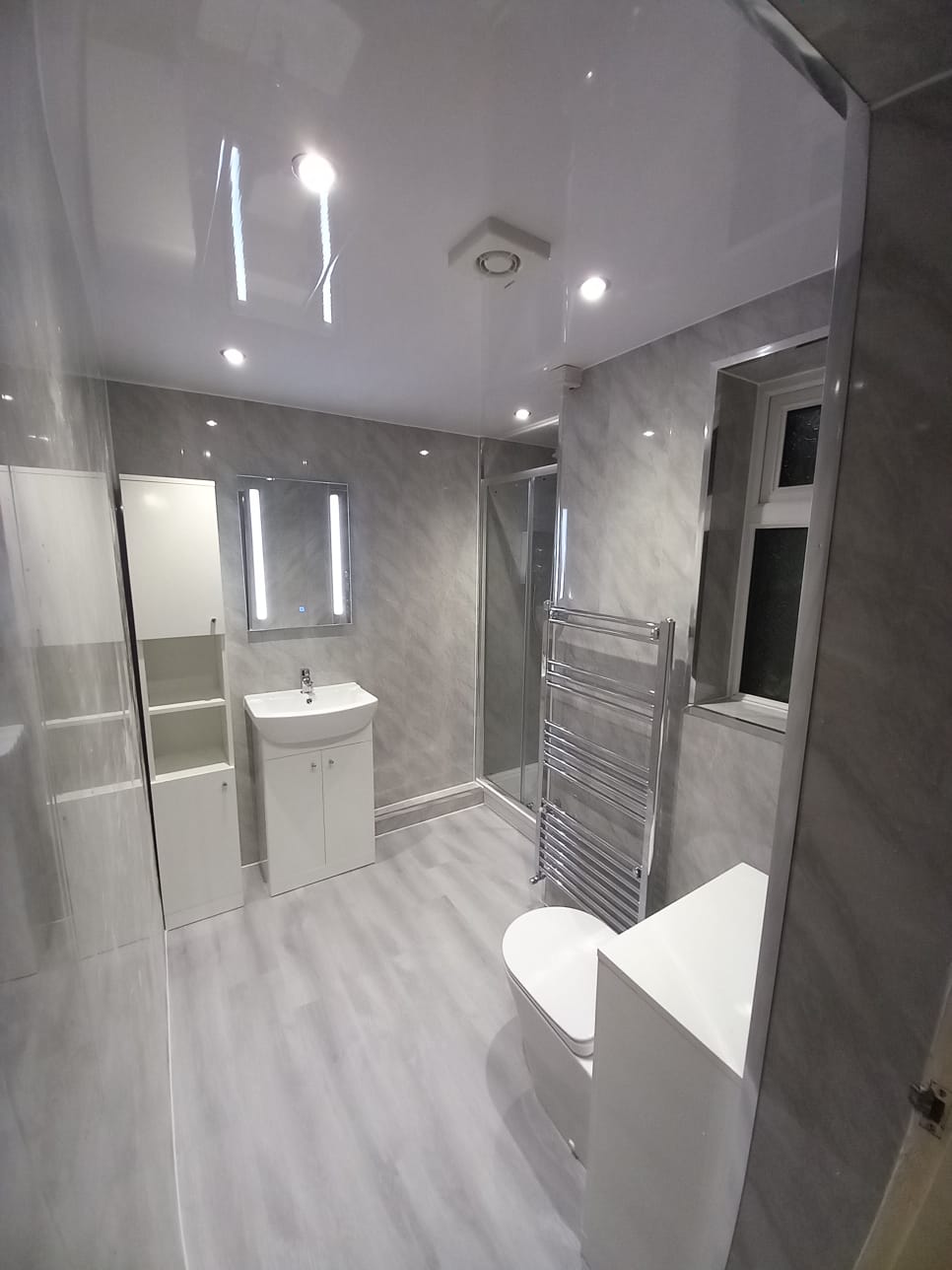 Finished bathroom using Grey Marble panels