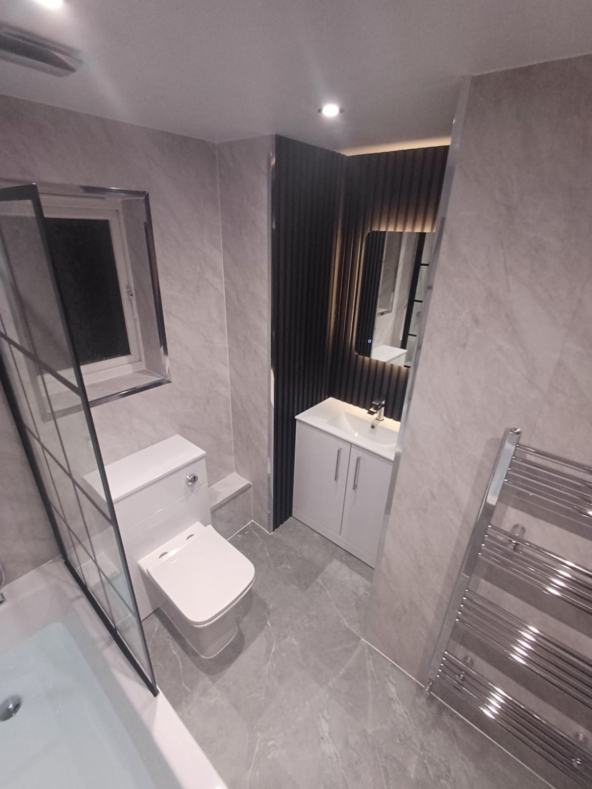 Finished bathroom using Grey Marble panels