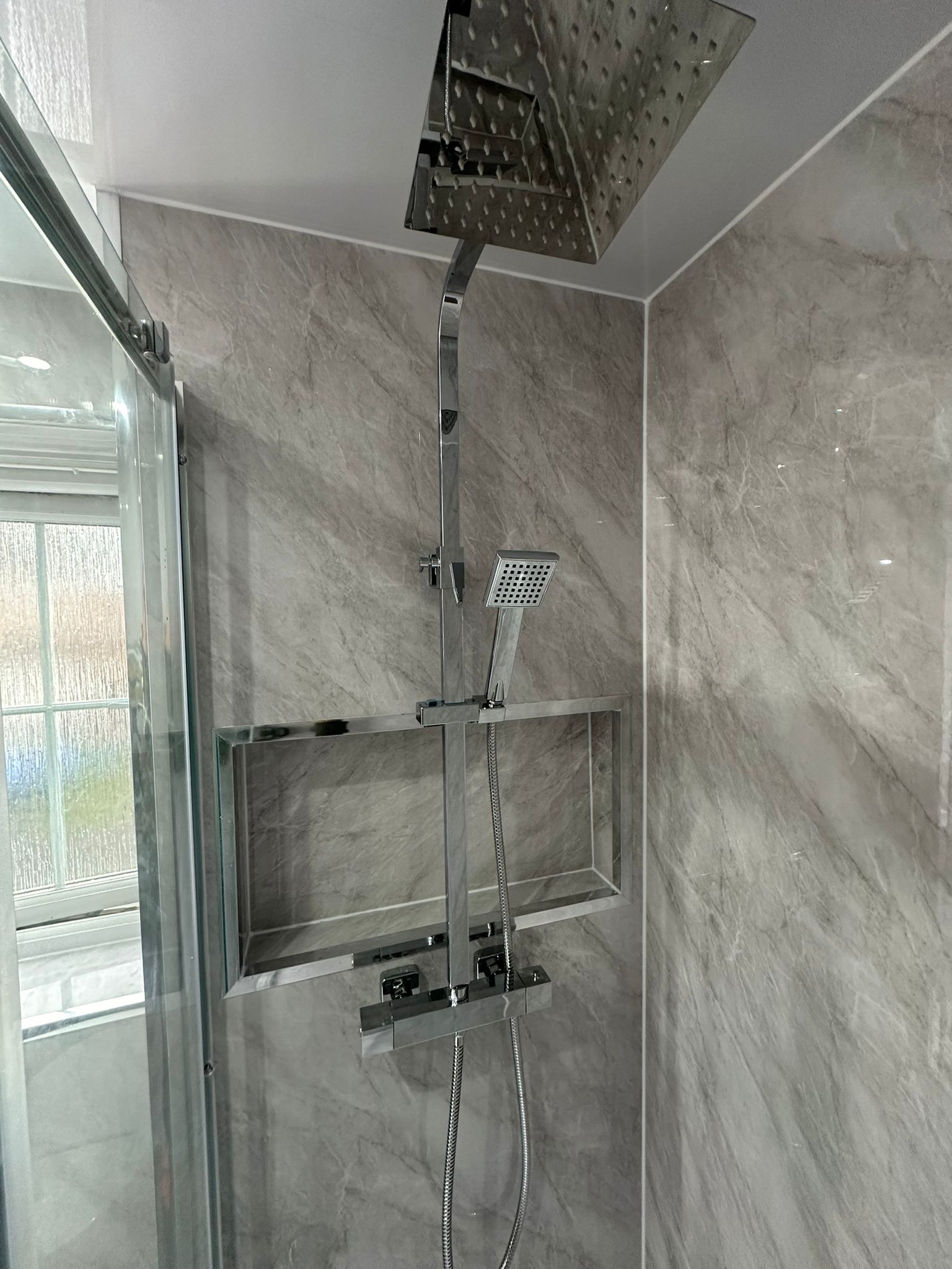Finished bathroom using Grey Marble panels