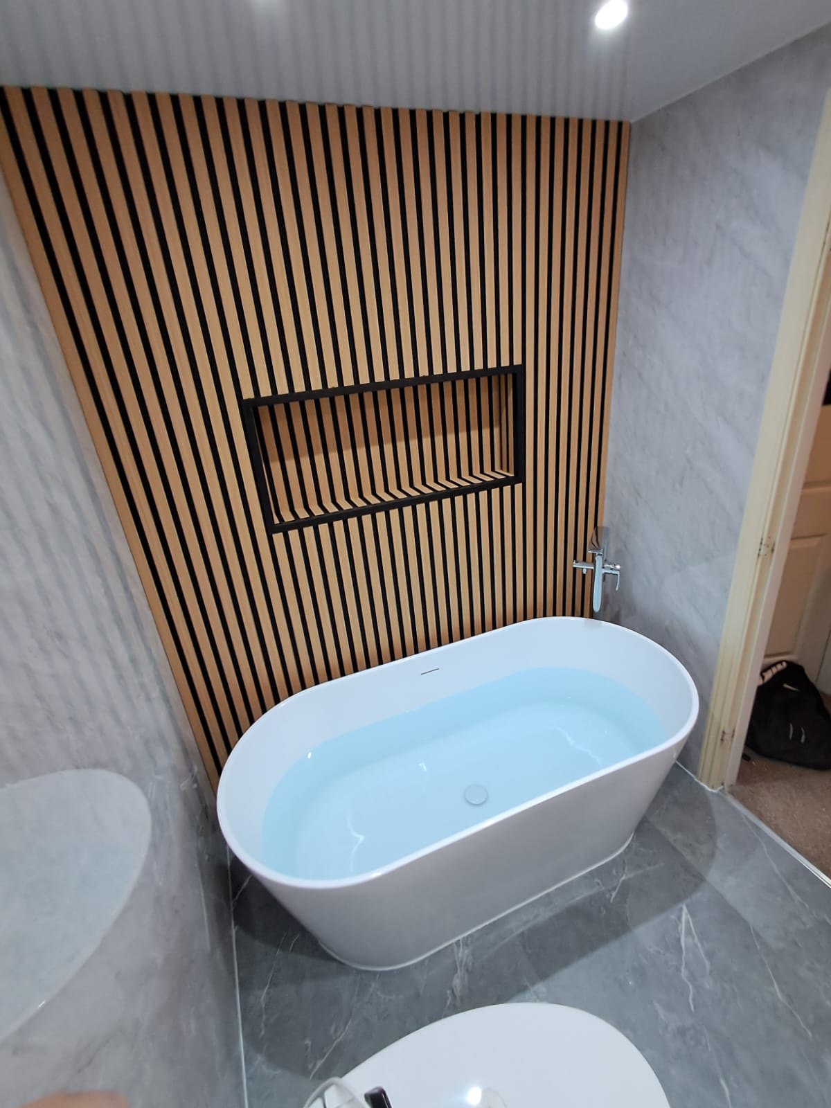 Finished bathroom using Grey Marble panels