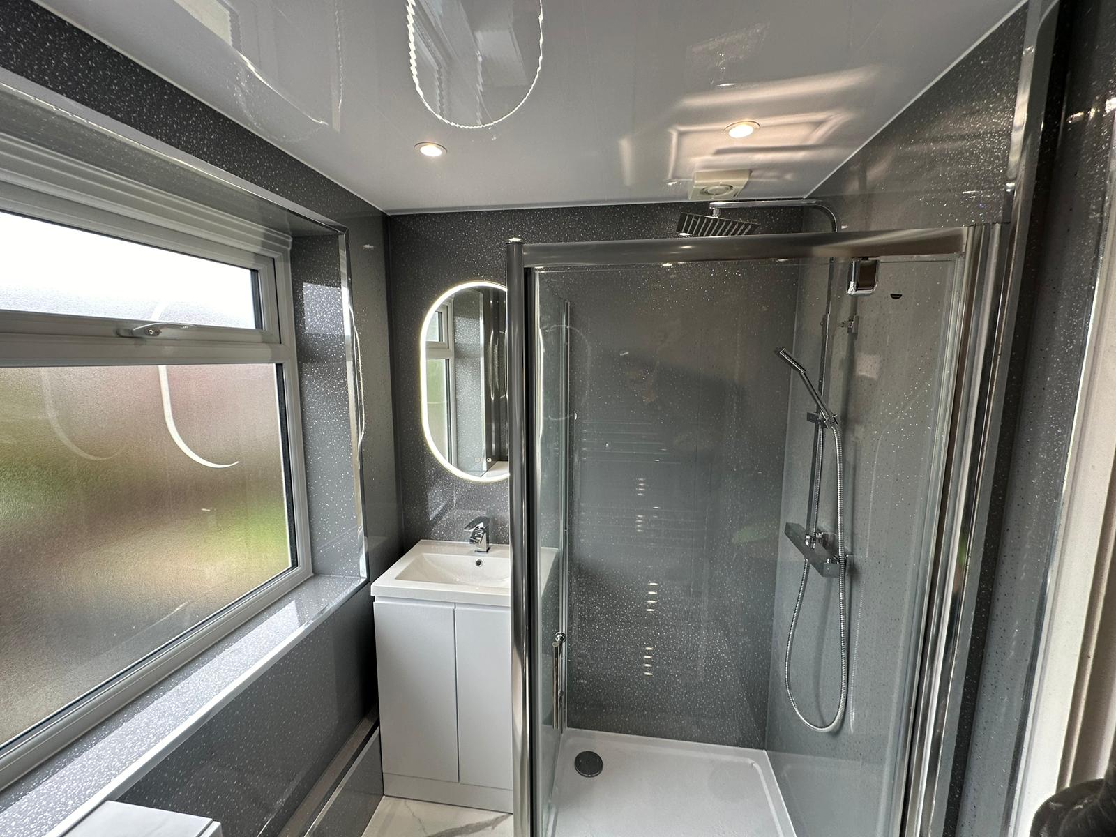 Finished bathroom using Grey Sparcle panels