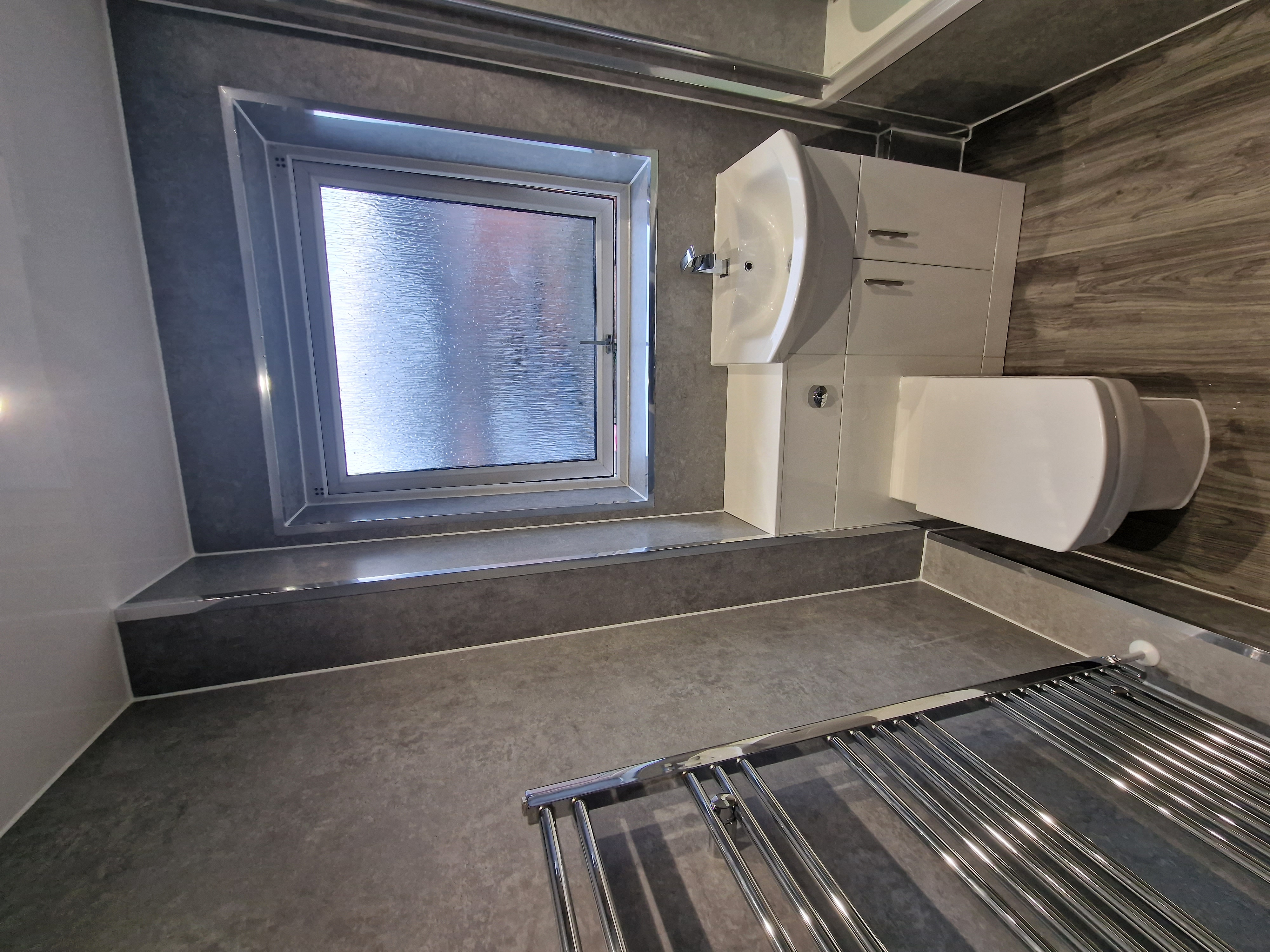 Finished bathroom using Grey Stone panels
