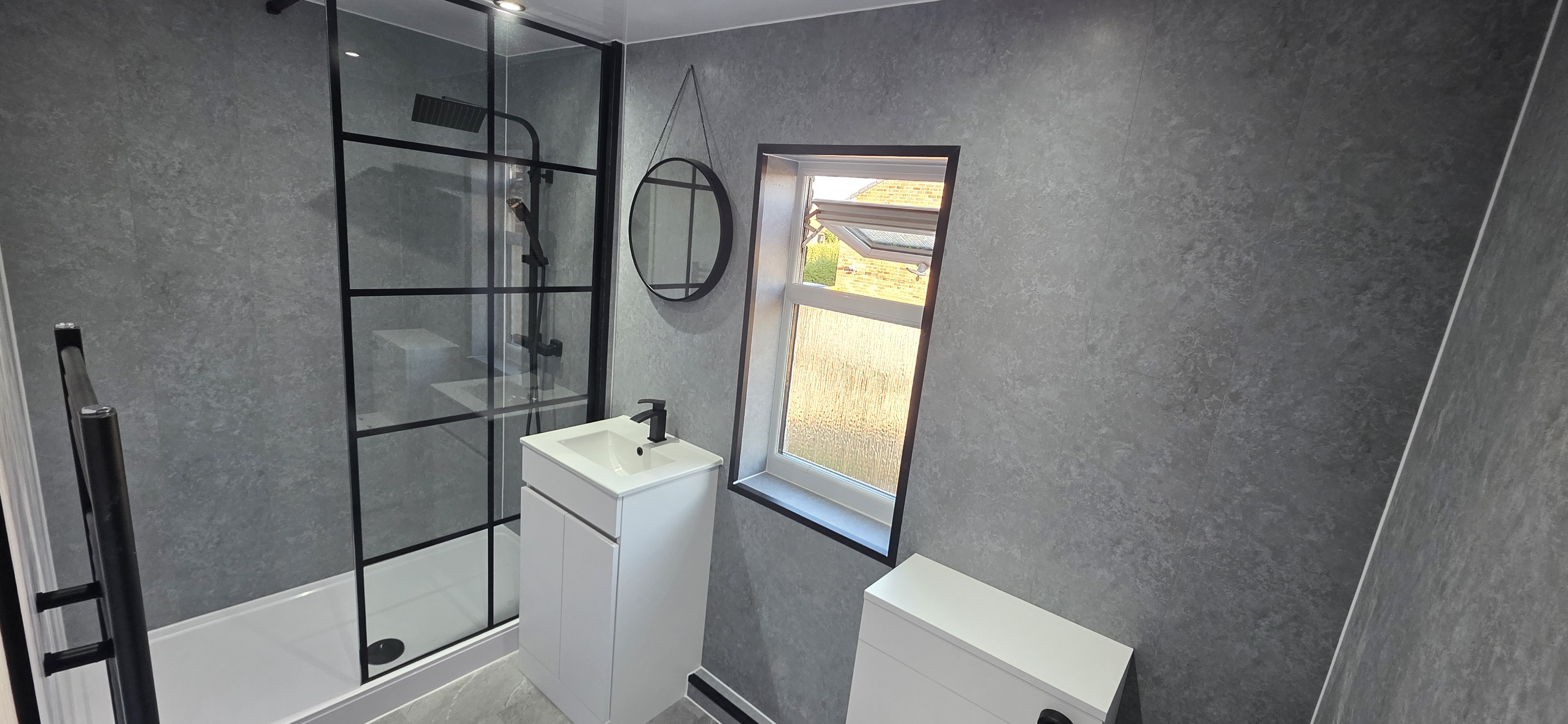 Finished bathroom using Grey Stone panels