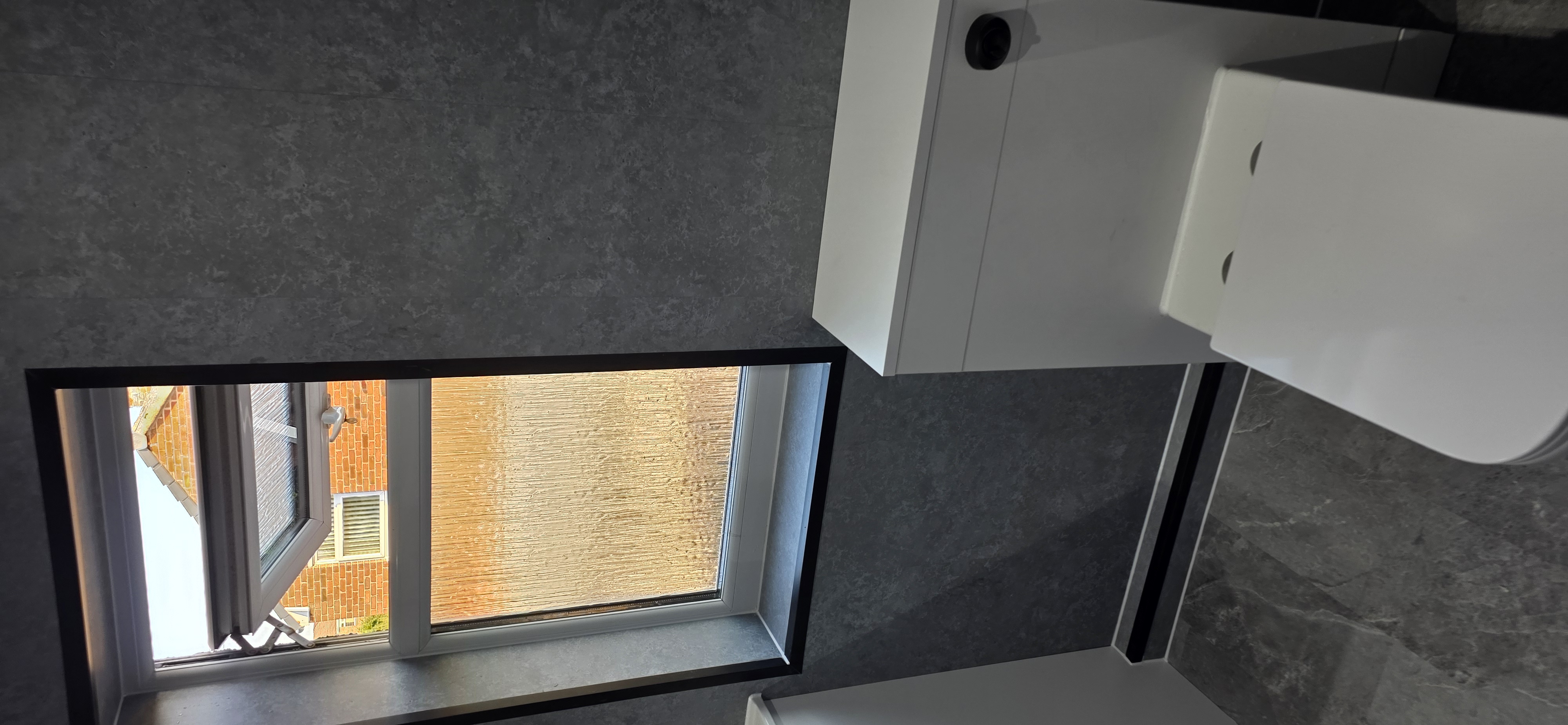 Finished bathroom using Grey Stone panels