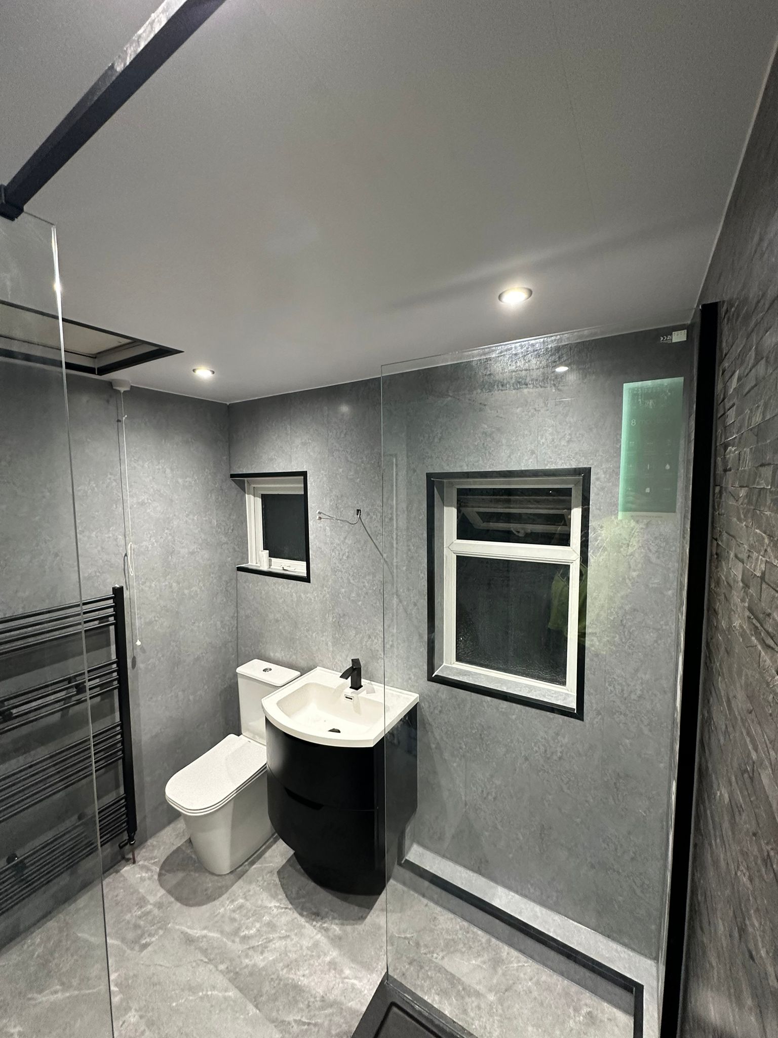 Finished bathroom using Grey Stone panels