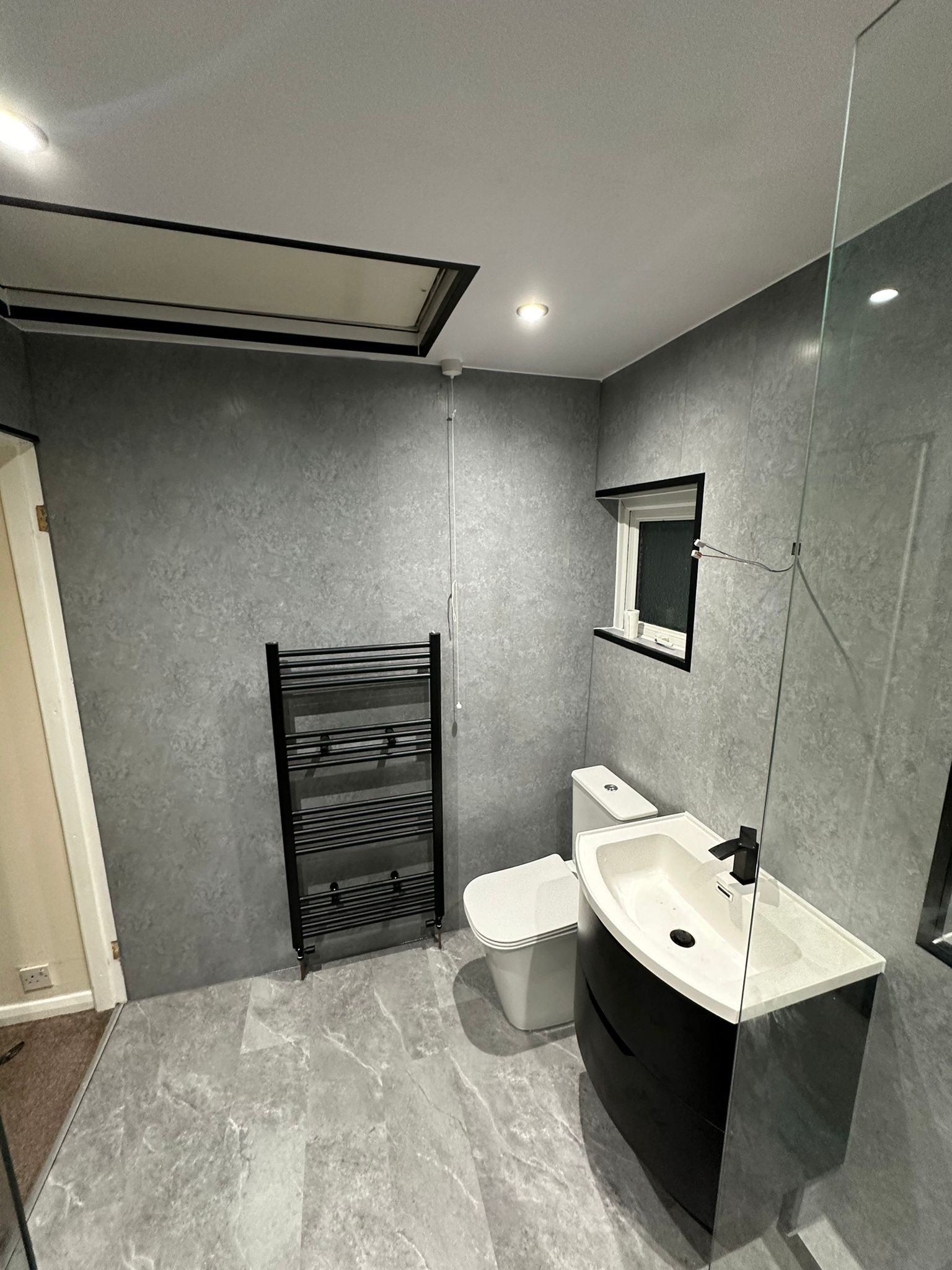 Finished bathroom using Grey Stone panels