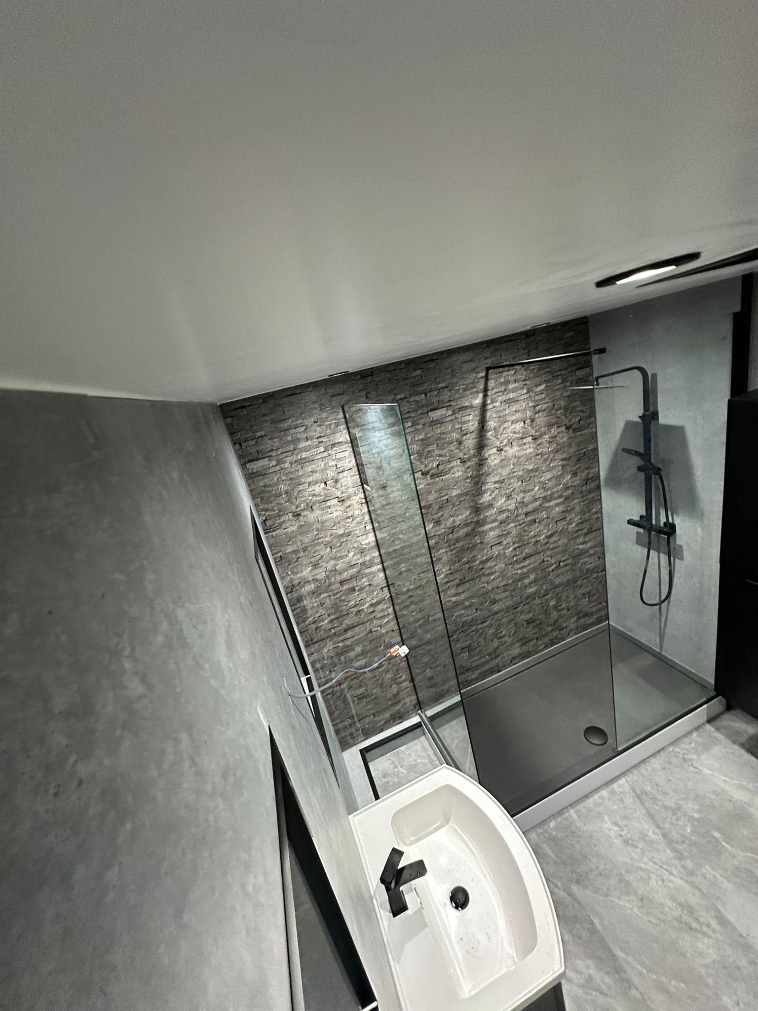 Finished bathroom using Grey Stone panels