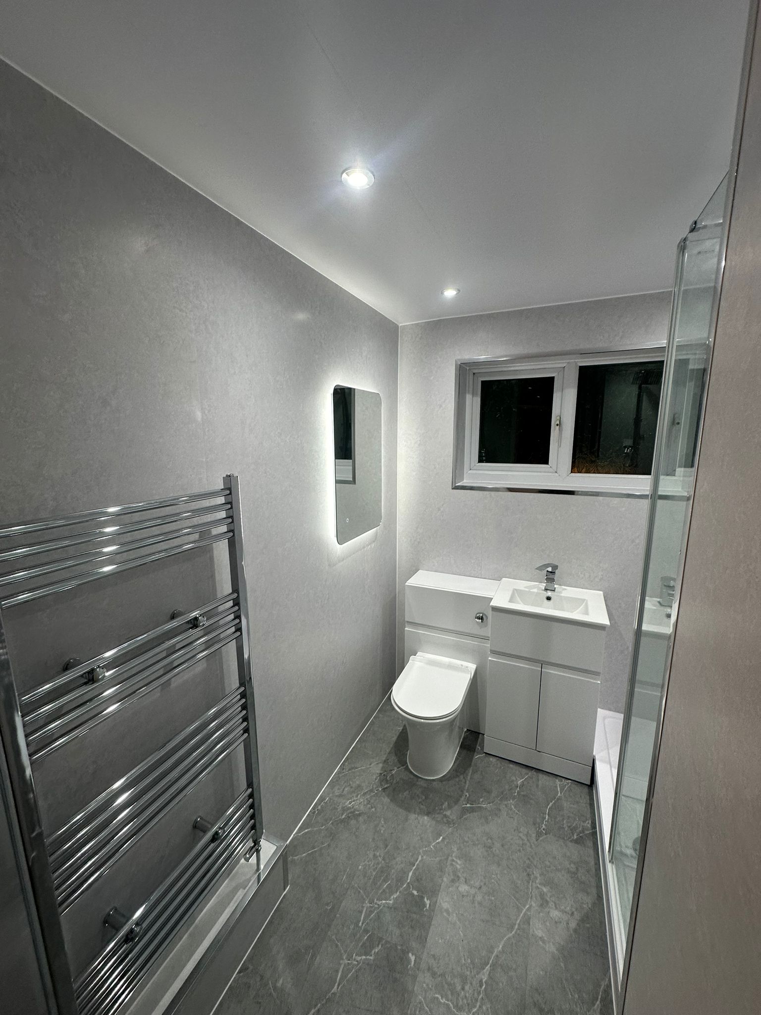 Finished bathroom using Grey Stone panels