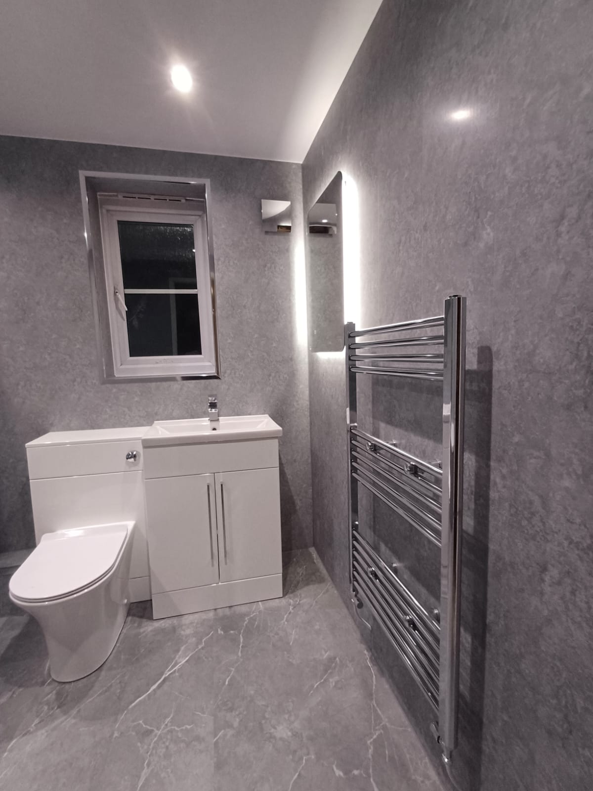 Finished bathroom using Grey Stone panels