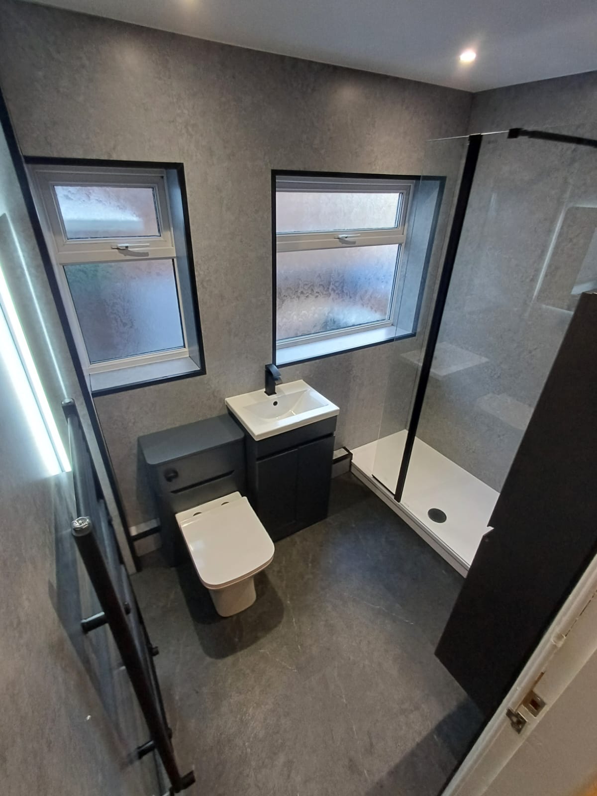 Finished bathroom using Grey Stone panels