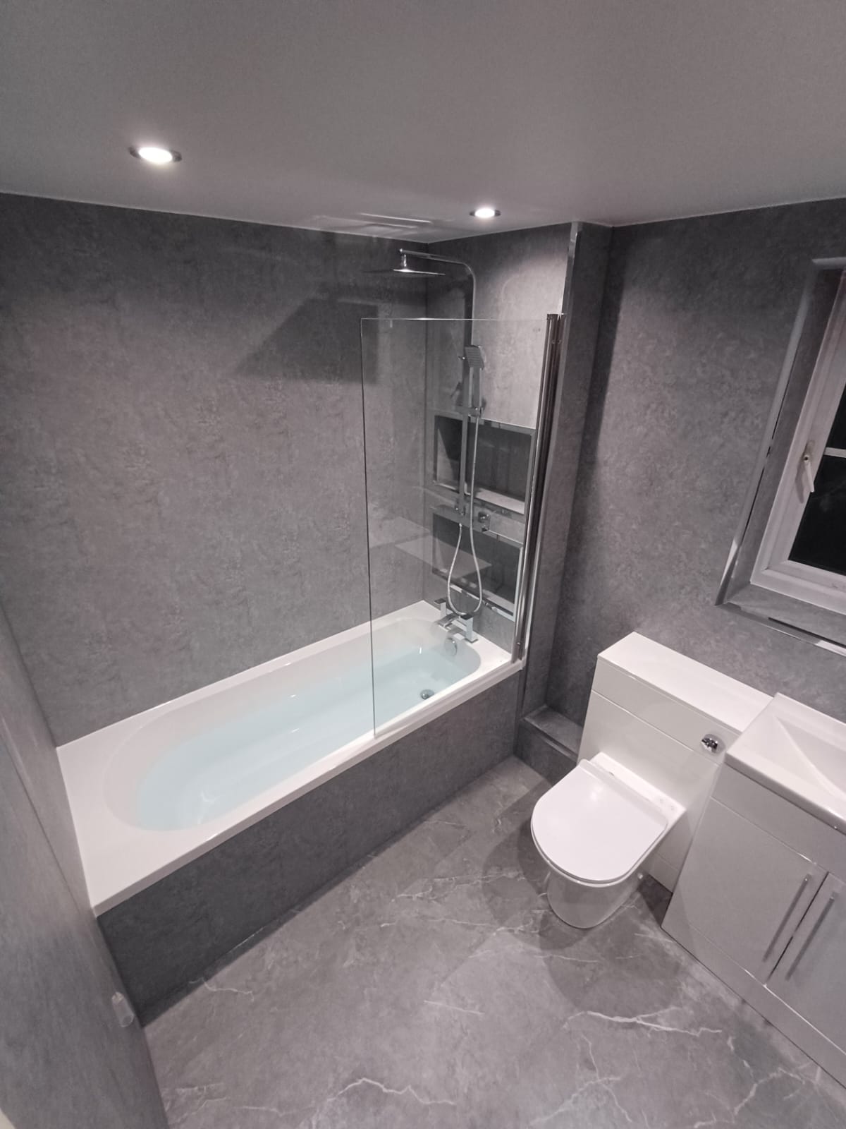 Finished bathroom using Grey Stone panels