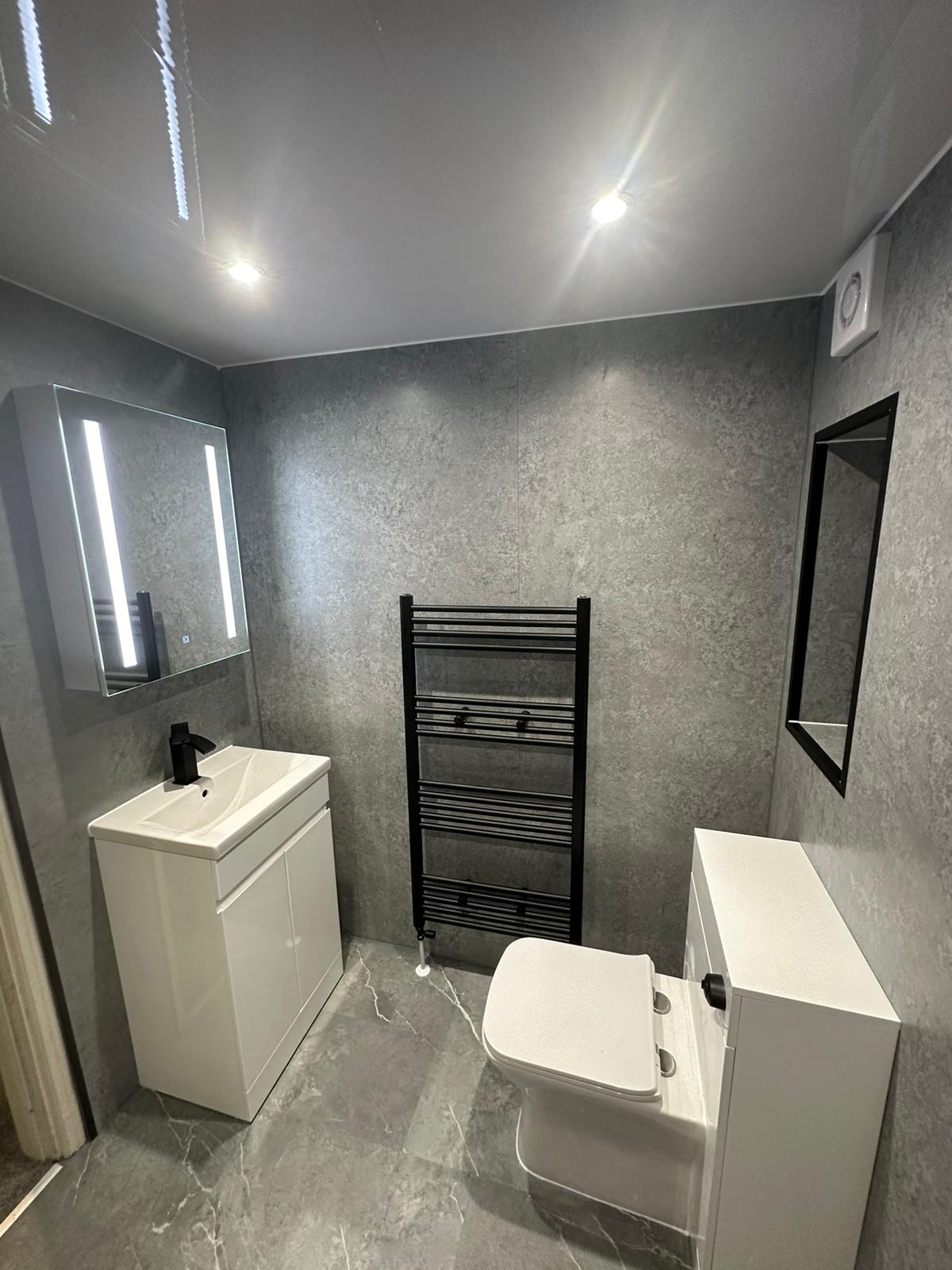 Finished bathroom using Grey Stone panels