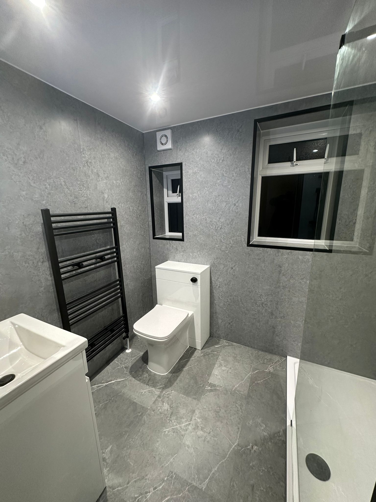 Finished bathroom using Grey Stone panels