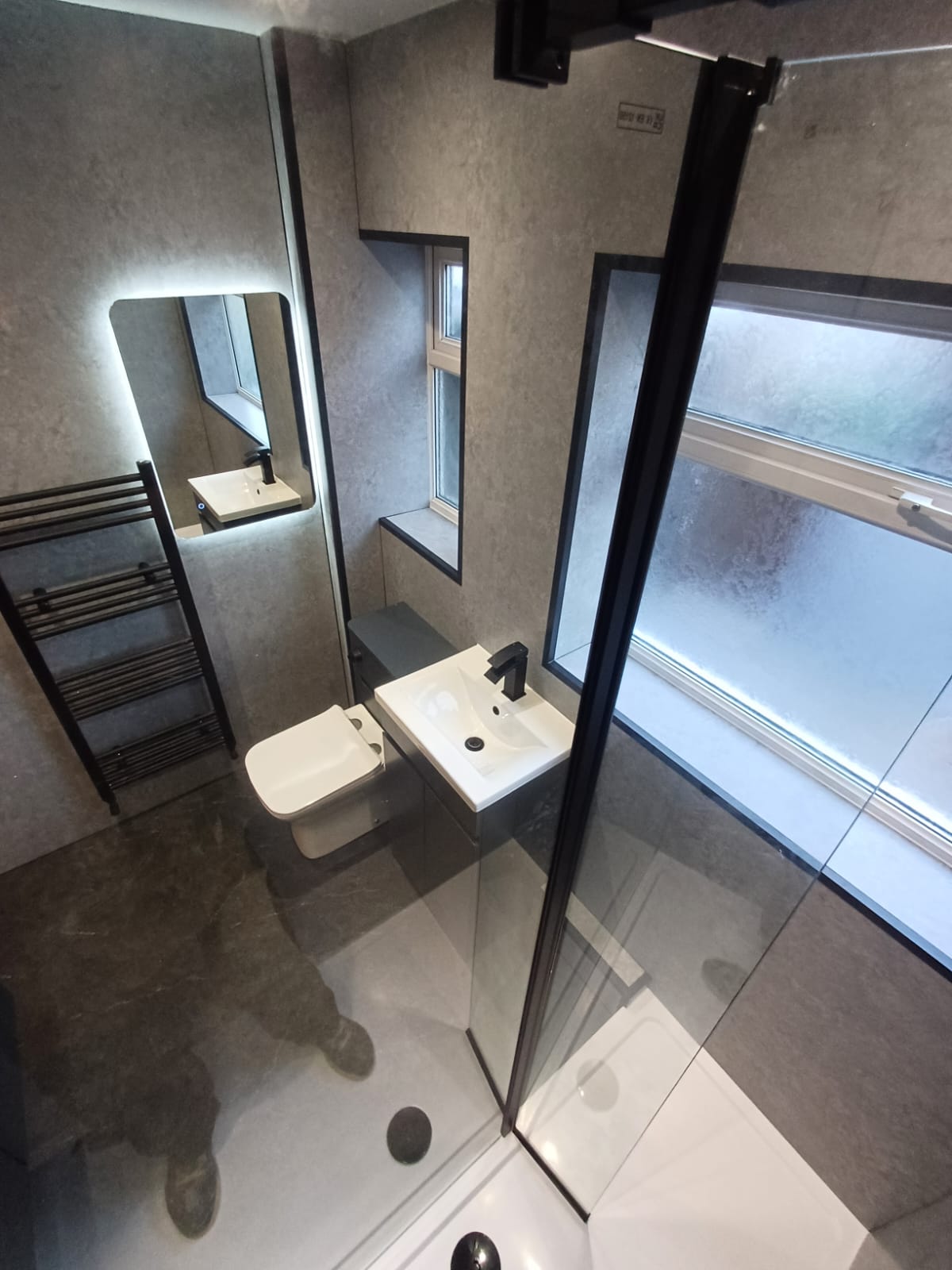 Finished bathroom using Grey Stone panels