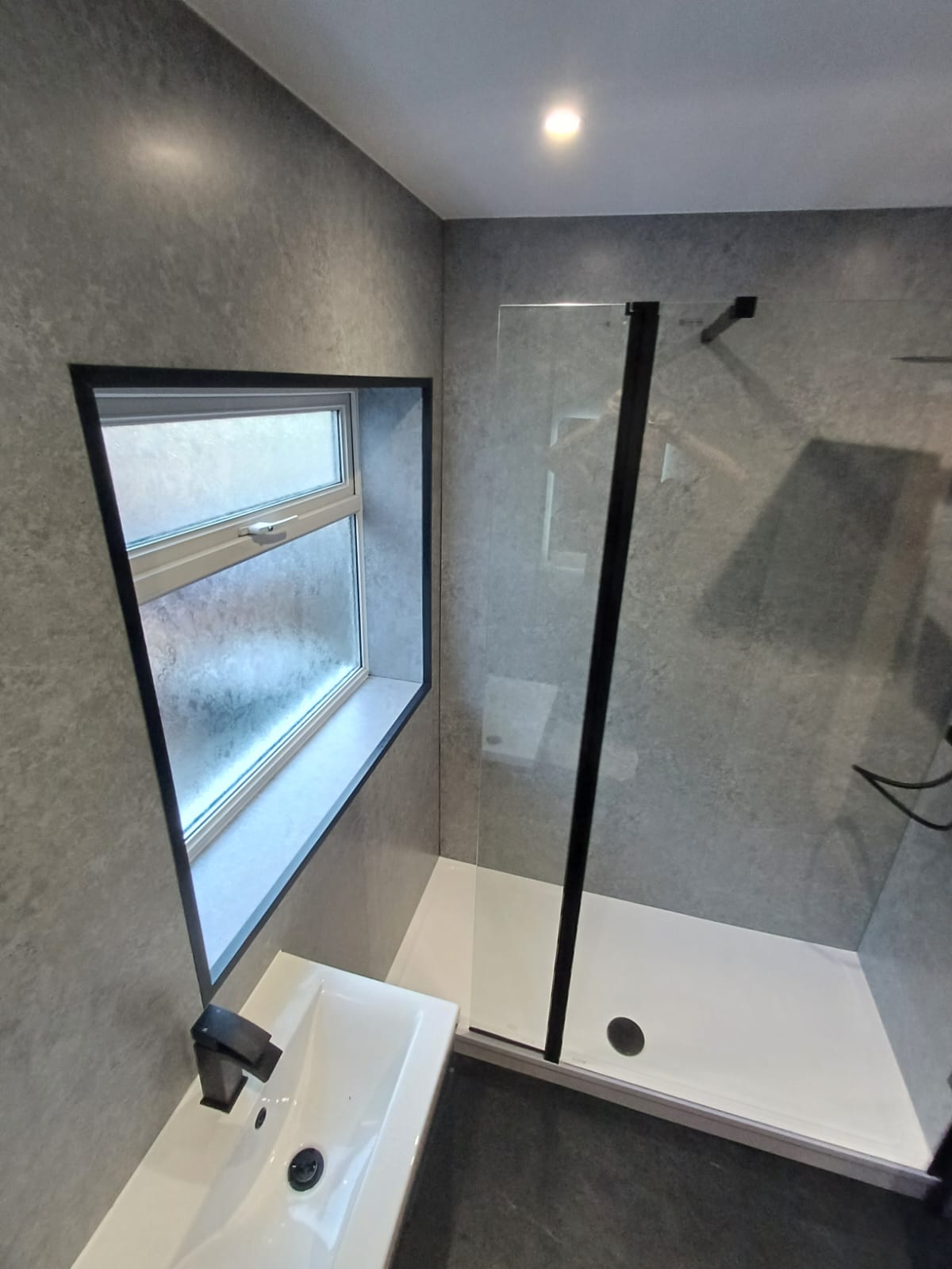 Finished bathroom using Grey Stone panels