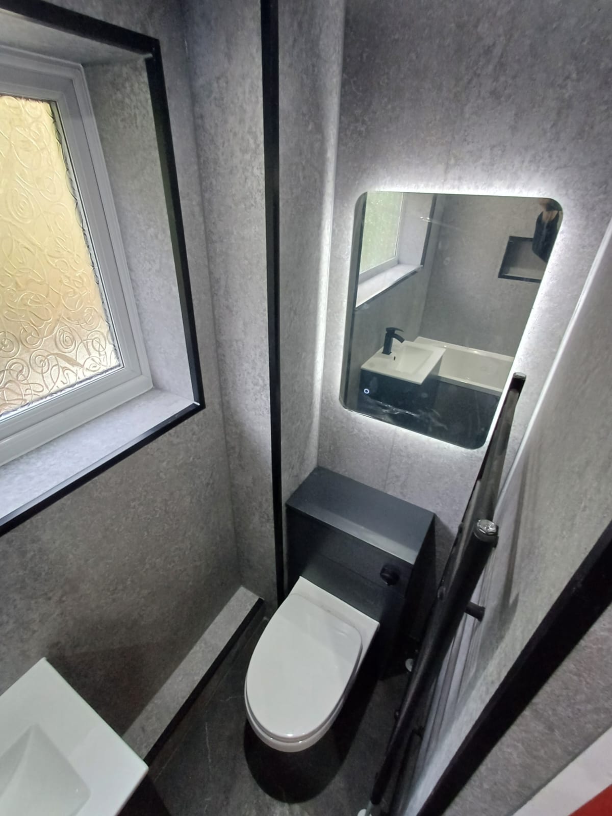 Finished bathroom using Grey Stone panels