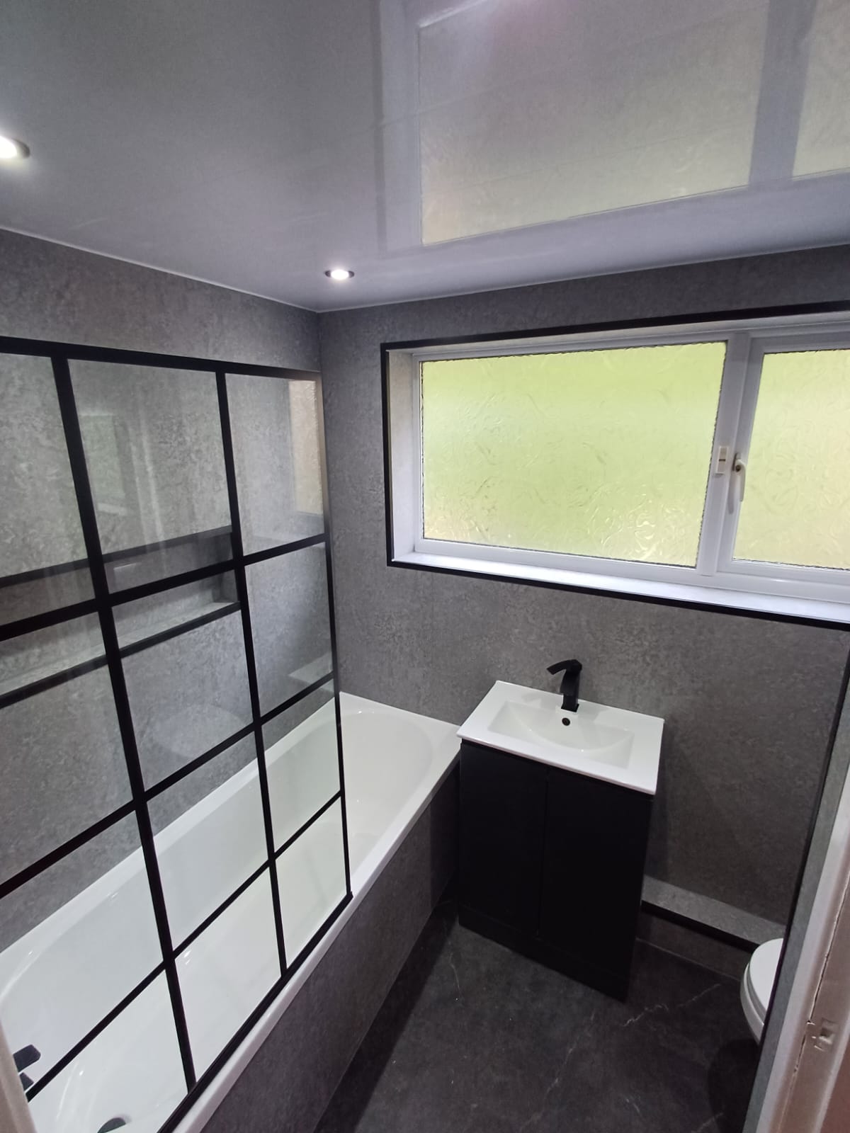 Finished bathroom using Grey Stone panels