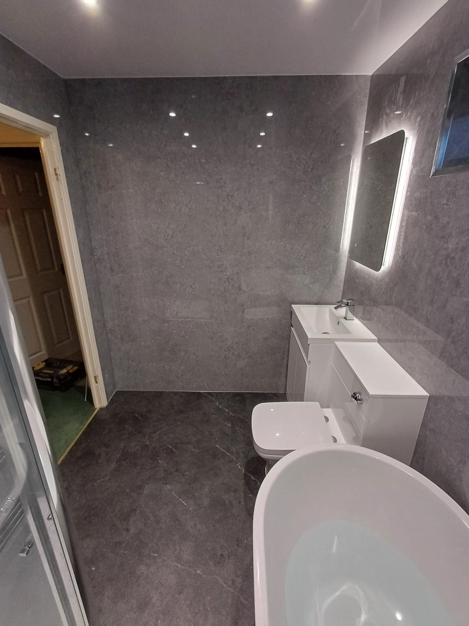 Finished bathroom using Grey Stone Gloss panels