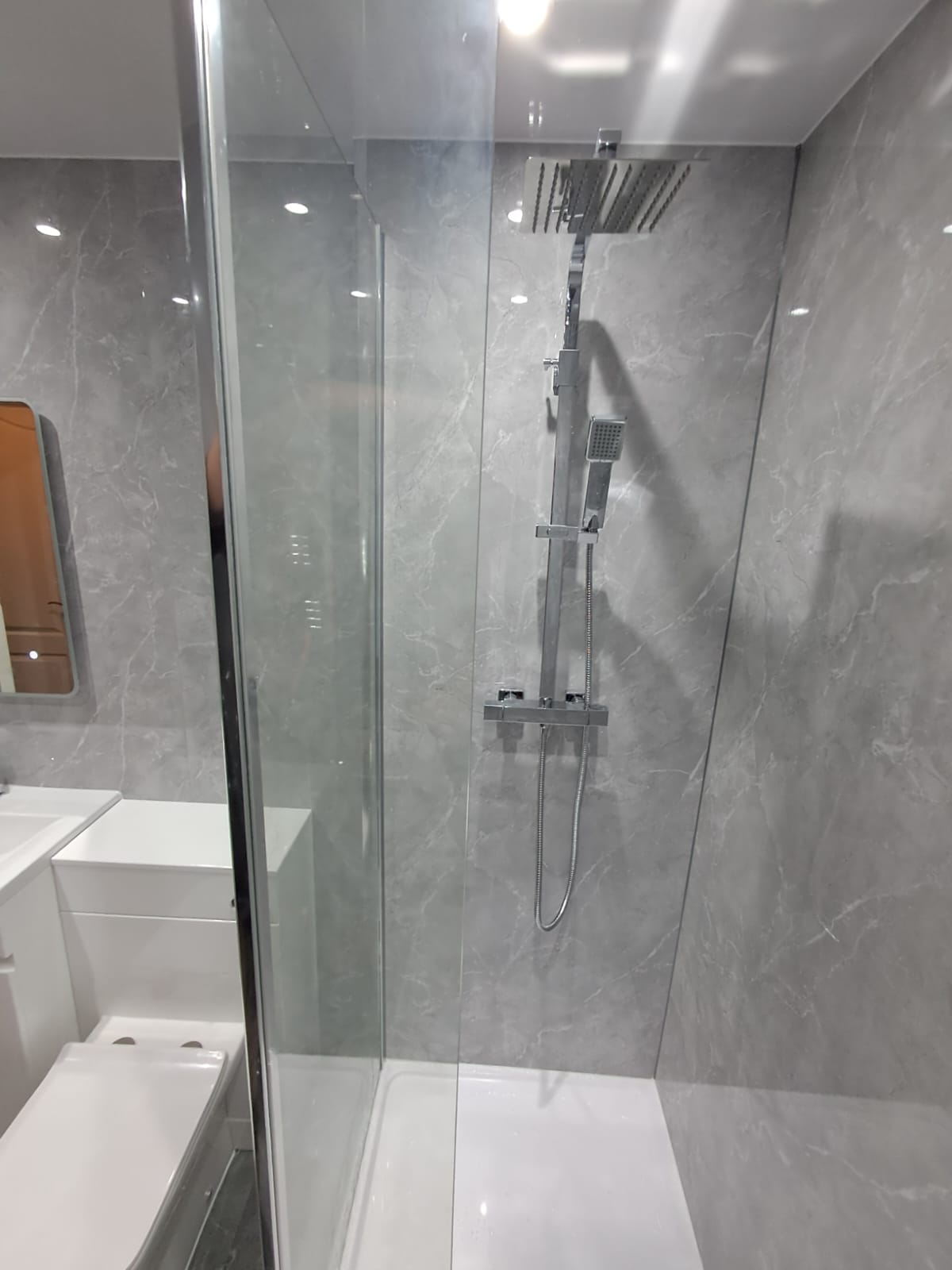 Finished bathroom using Light Grey Marble panels