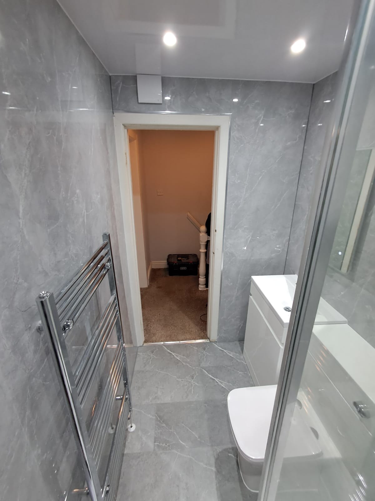 Finished bathroom using Light Grey Marble panels