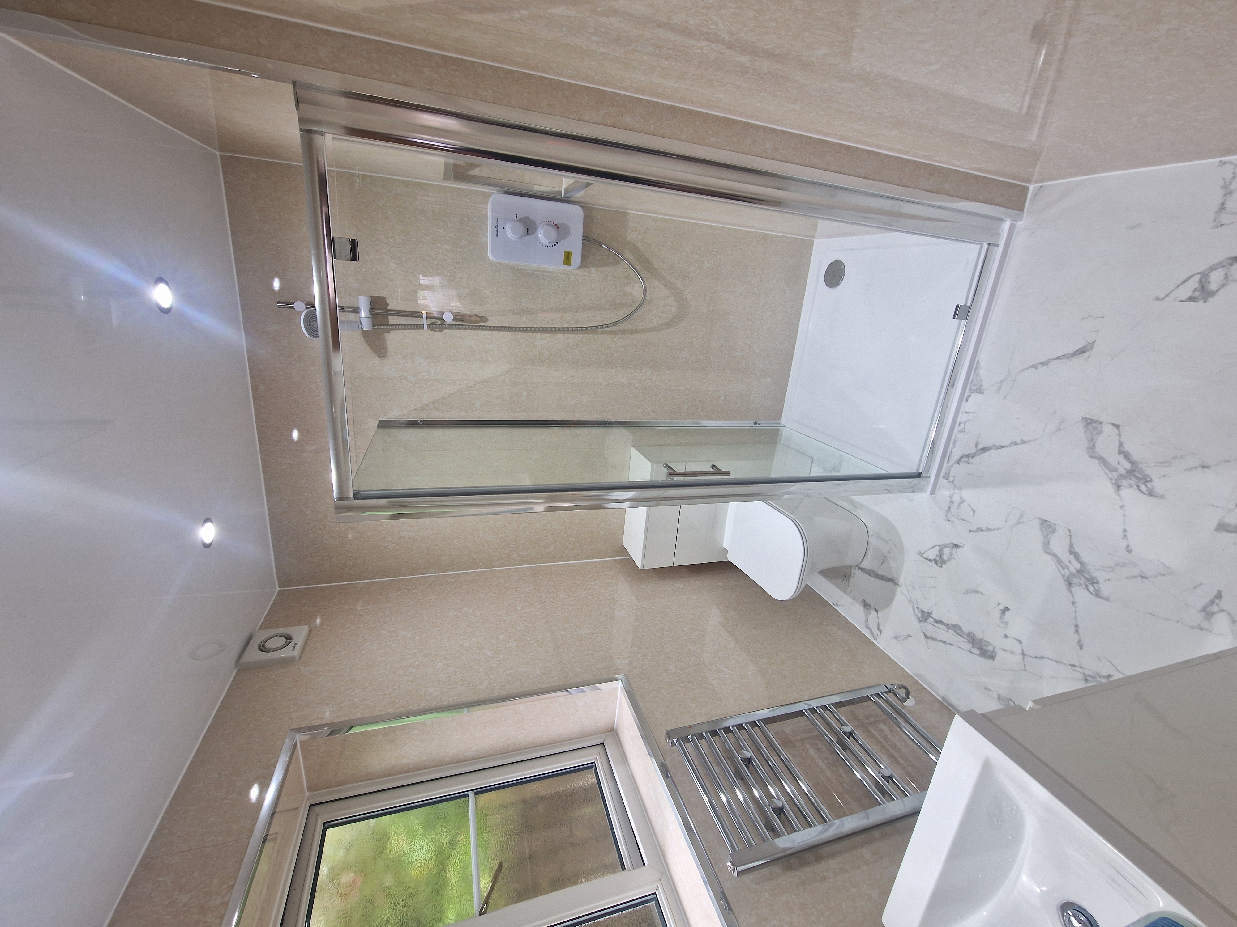 Finished bathroom using Travertine panels