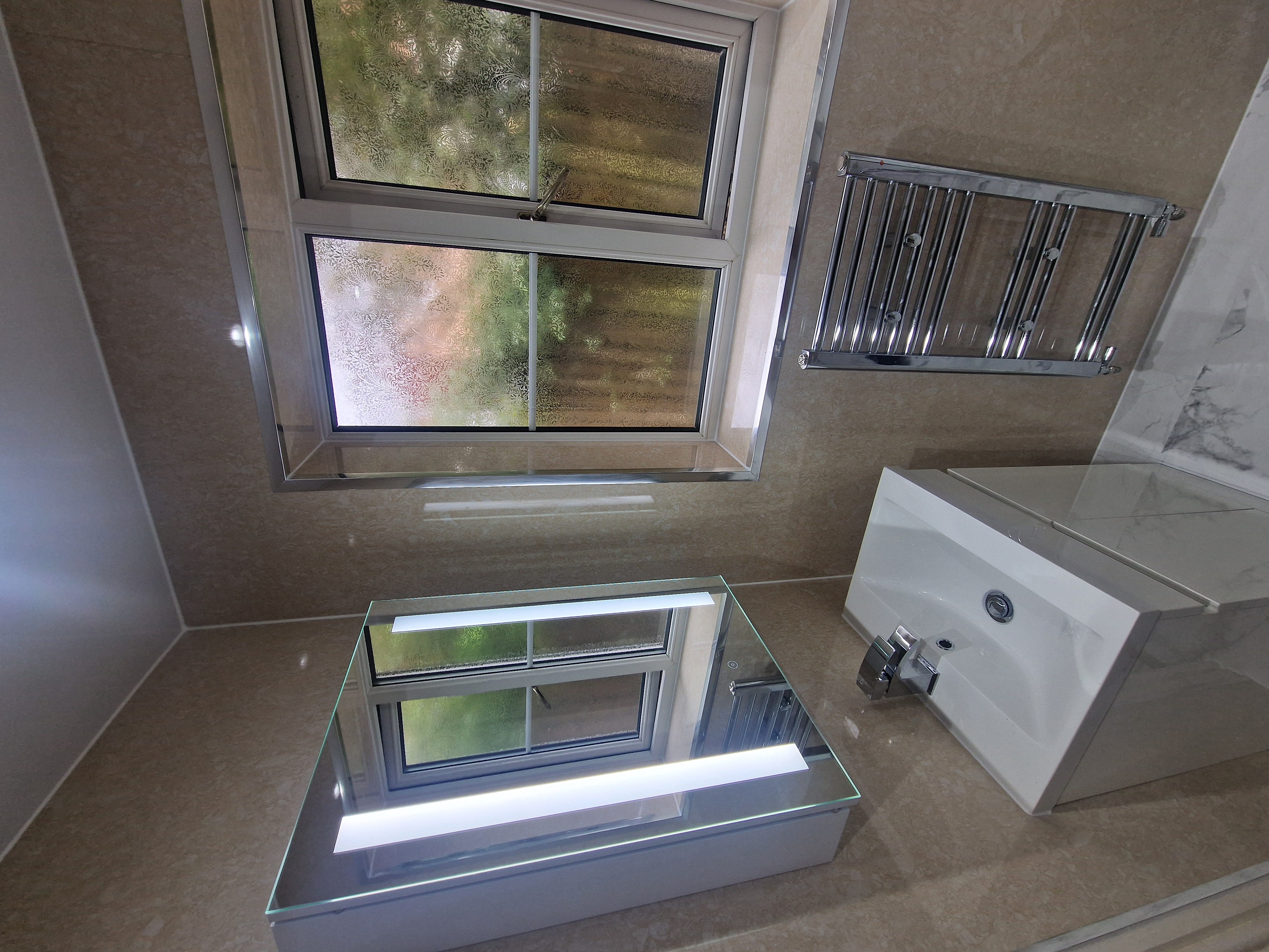 Finished bathroom using Travertine panels