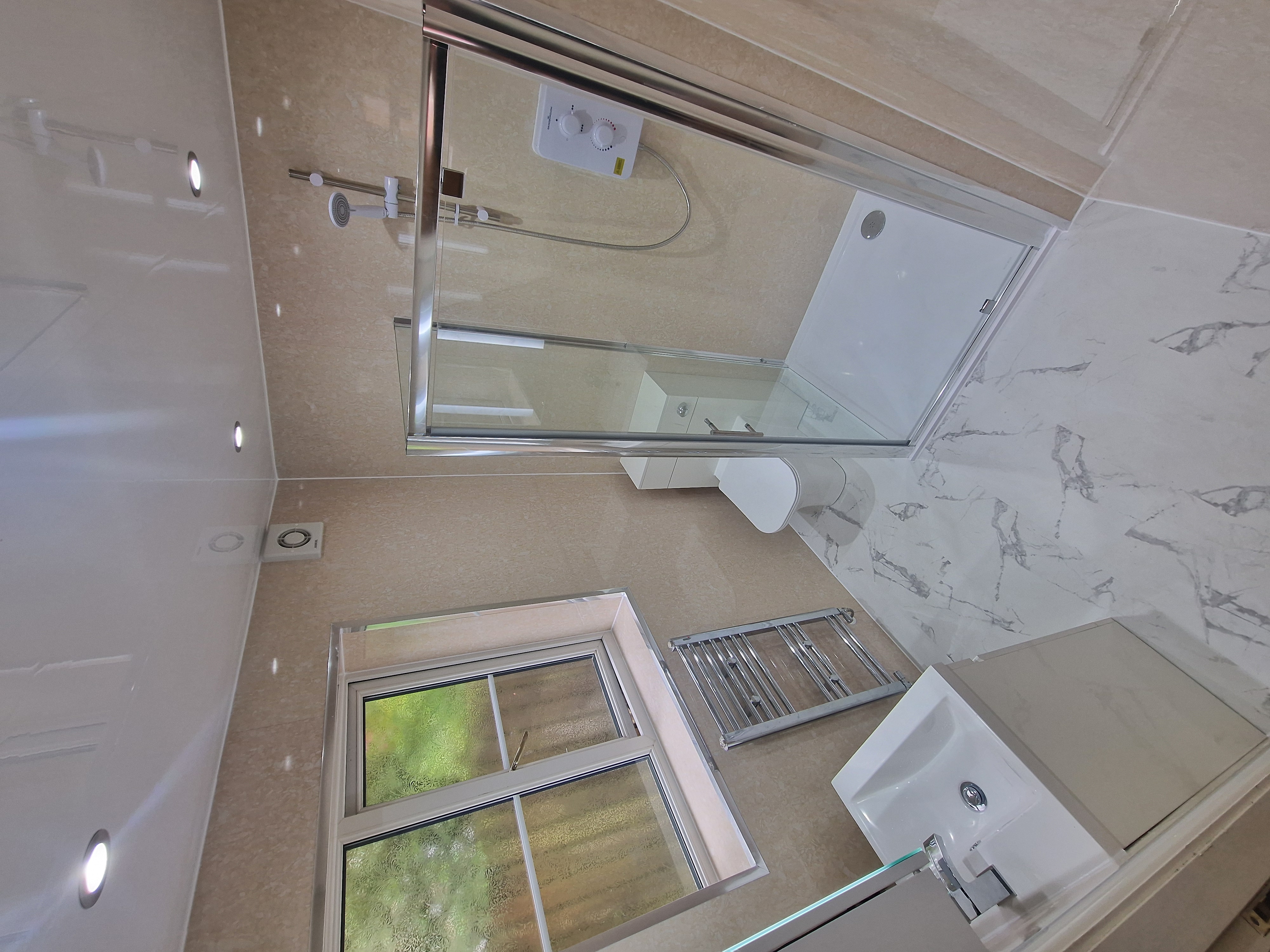 Finished bathroom using Travertine panels