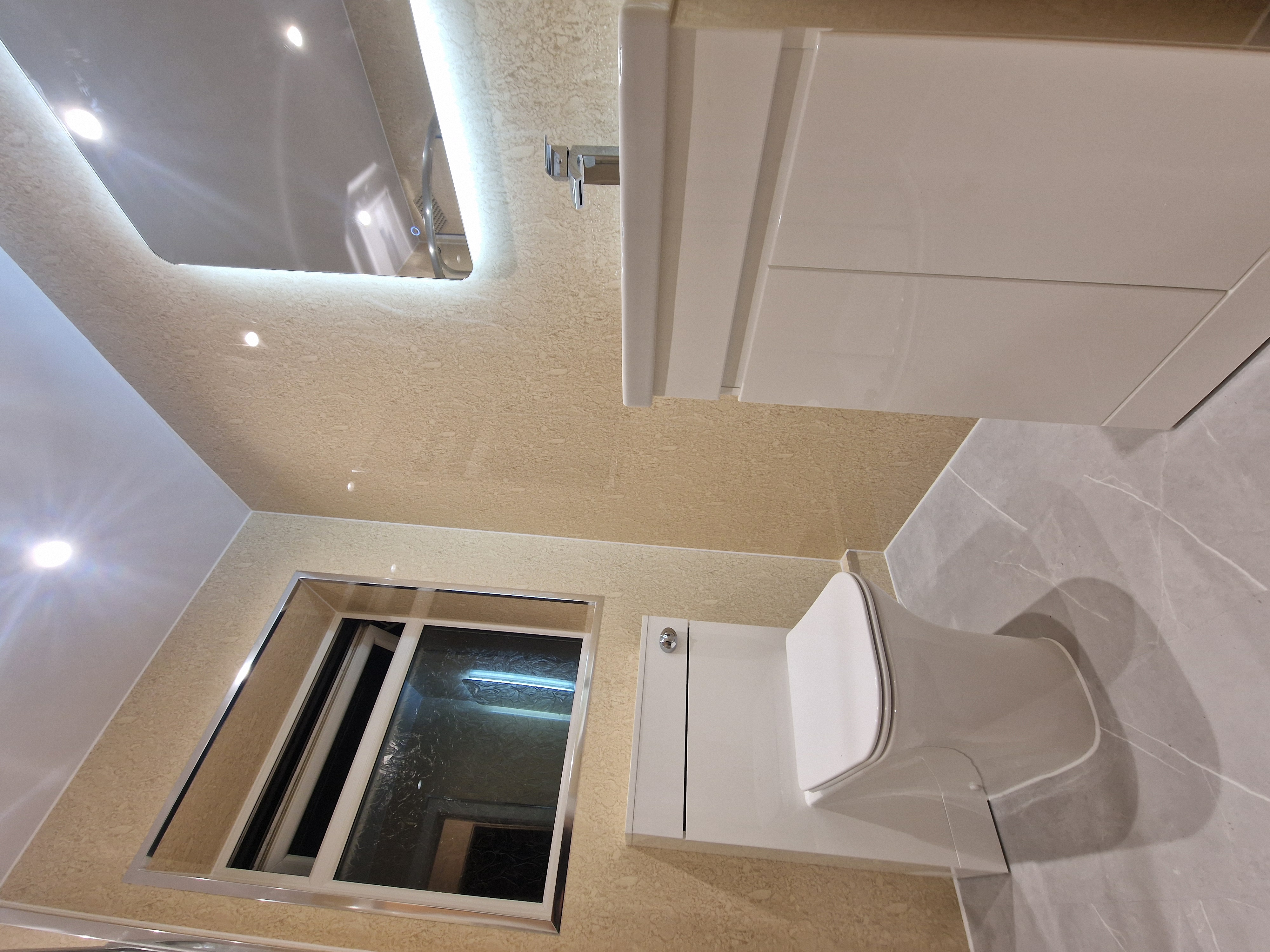 Finished bathroom using Travertine panels