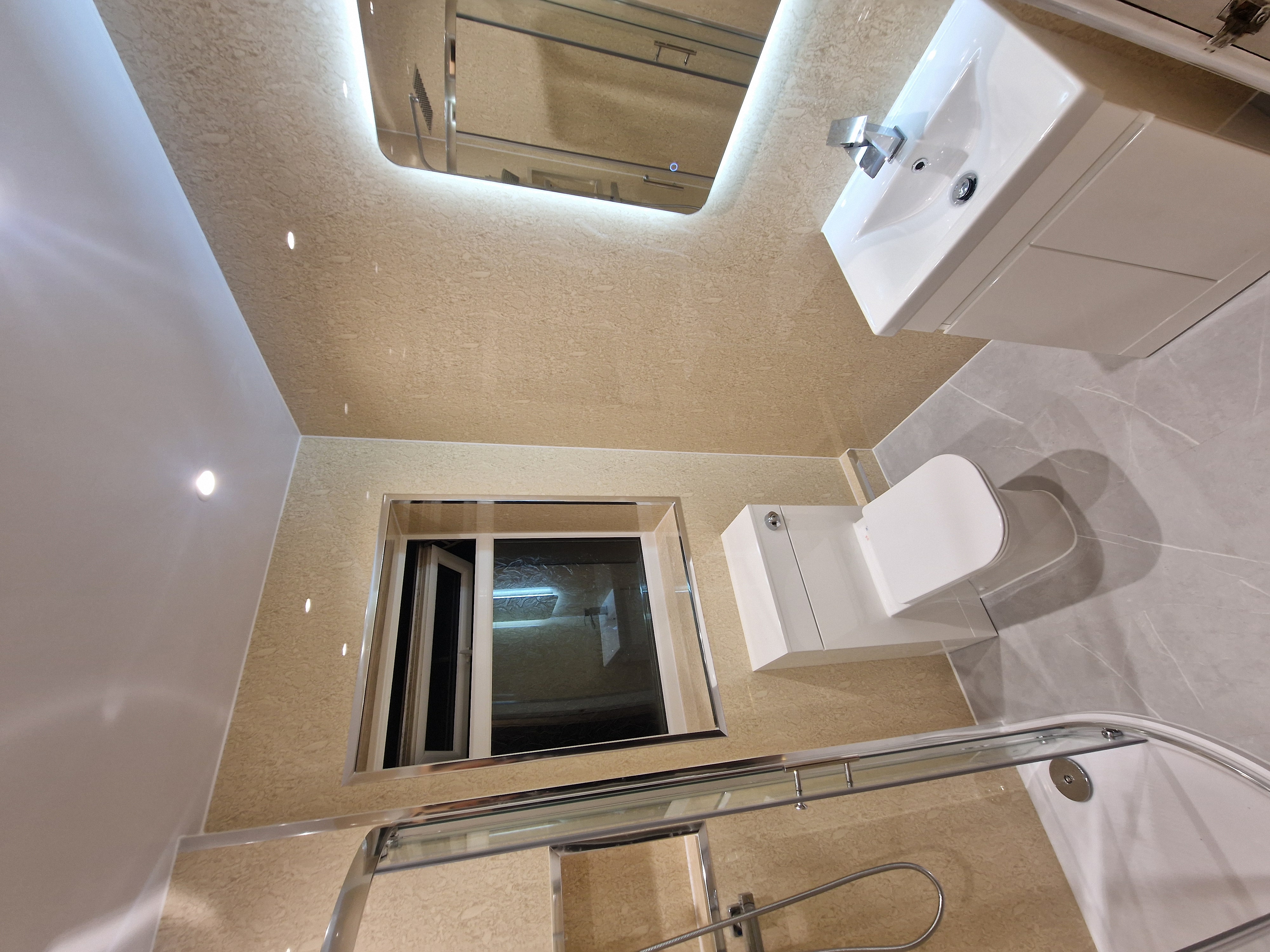 Finished bathroom using Travertine panels