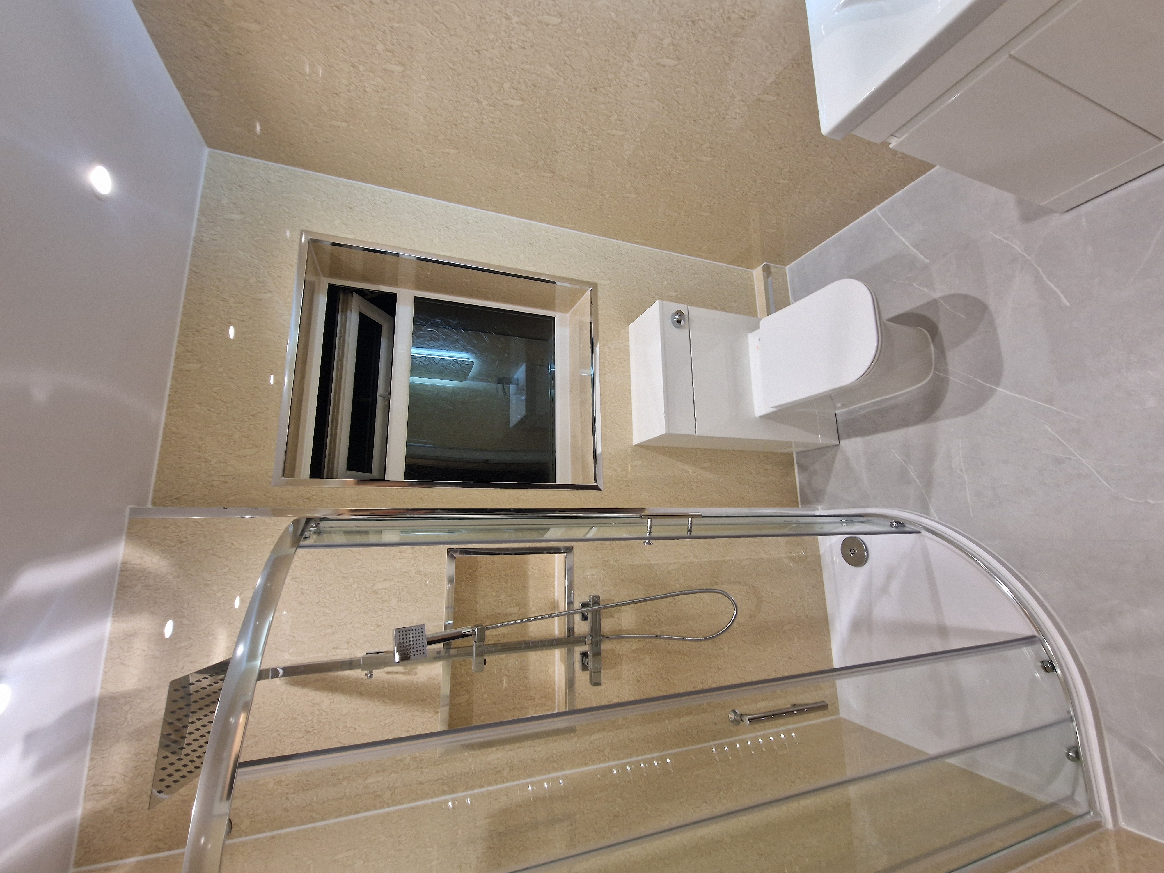 Finished bathroom using Travertine panels