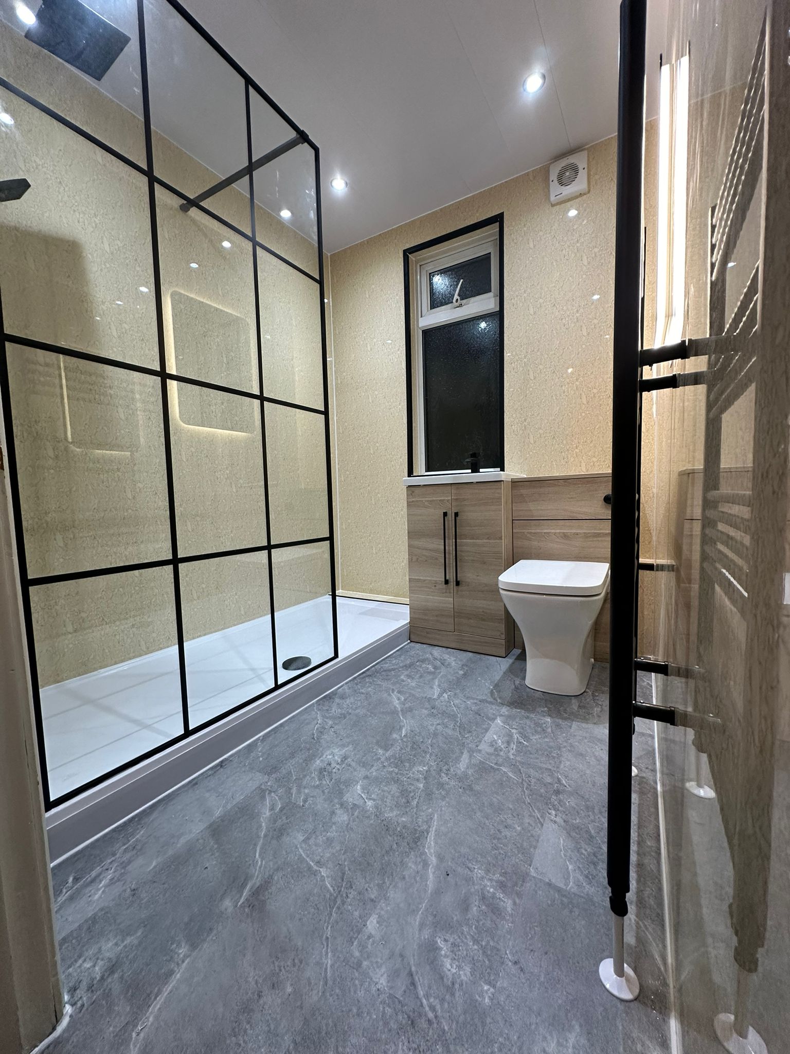 Finished bathroom using Travertine panels