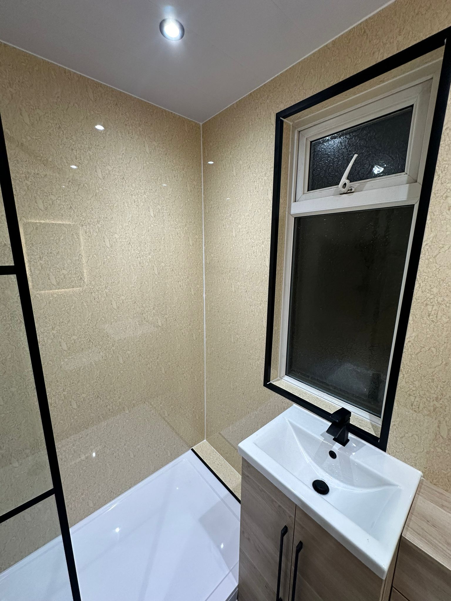 Finished bathroom using Travertine panels