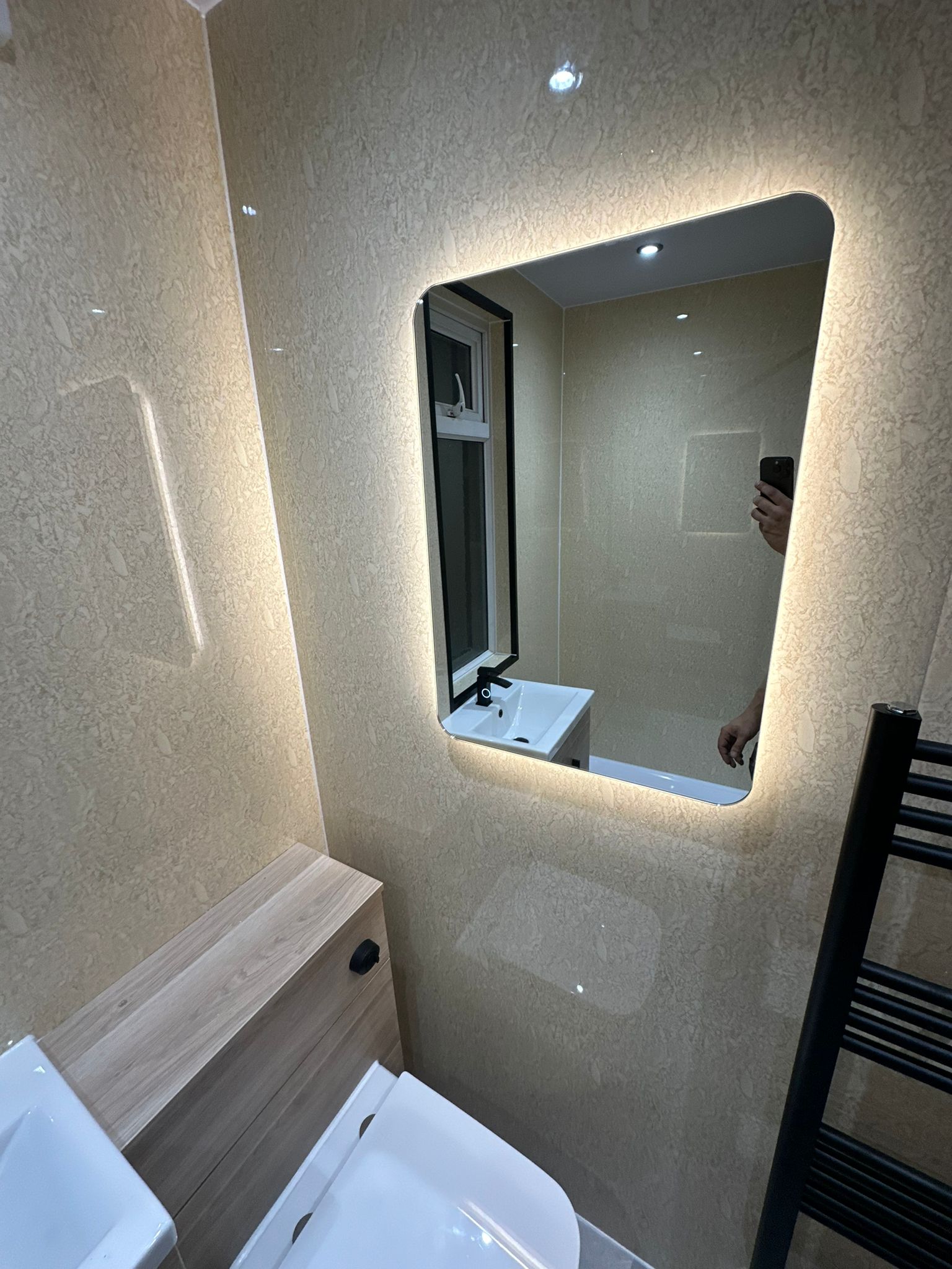 Finished bathroom using Travertine panels