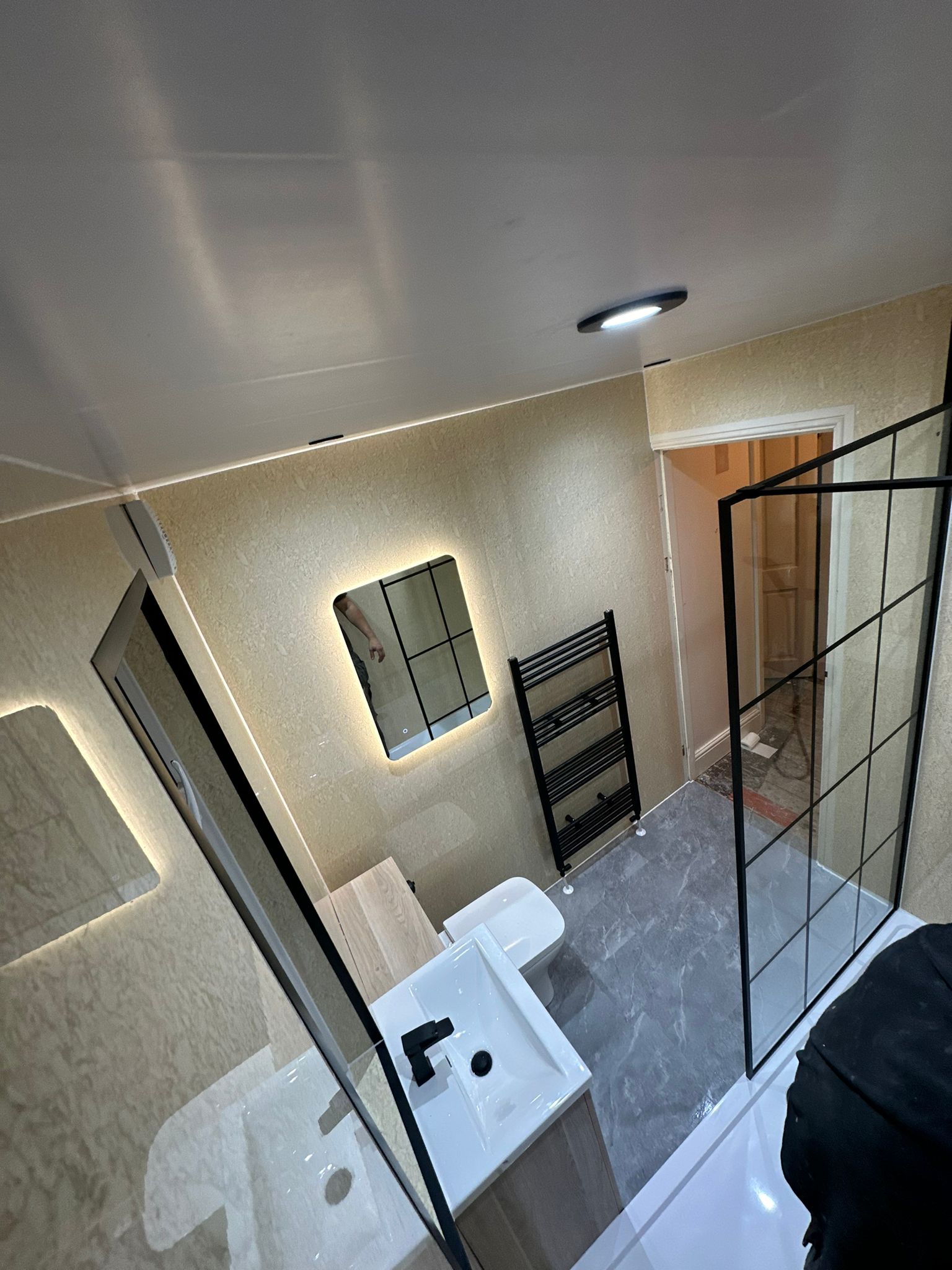 Finished bathroom using Travertine panels