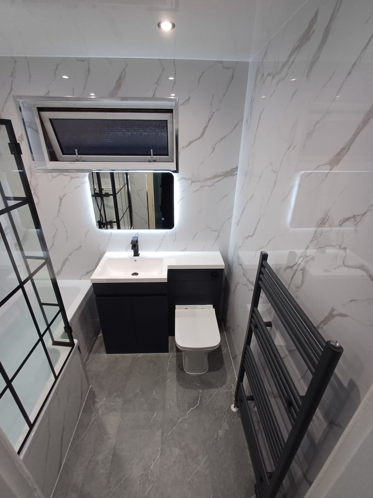 Finished bathroom using Carrera Gloss panels